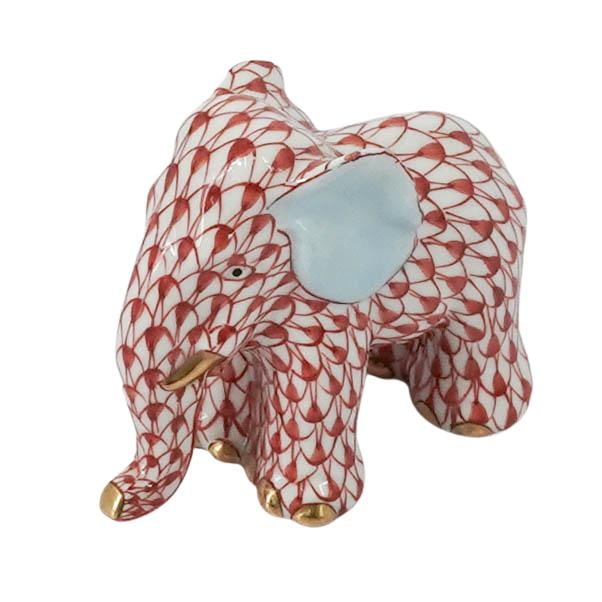 Herend Rust Fishnet Porcelain Elephant: Herend Rust Fishnet Porcelain Elephant 20th century, Hungarian A miniature Herend porcelain elephant in the rust or red fishnet color way. Marked on bottom with Herend hallmark, incised "5265". H 1.75