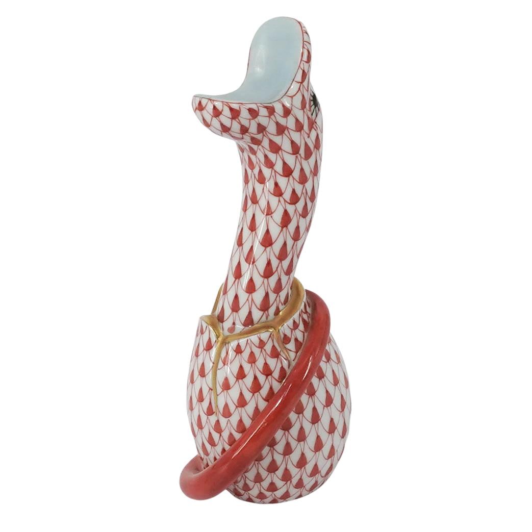 Herend Red Fishnet Porcelain Snake: Herend Red Fishnet Porcelain Snake Late 20th century, Hungarian A miniature Herend porcelain hatching snake (number 15344) in the red or rust fishnet color way. Marked on bottom with Herend hallmark, 