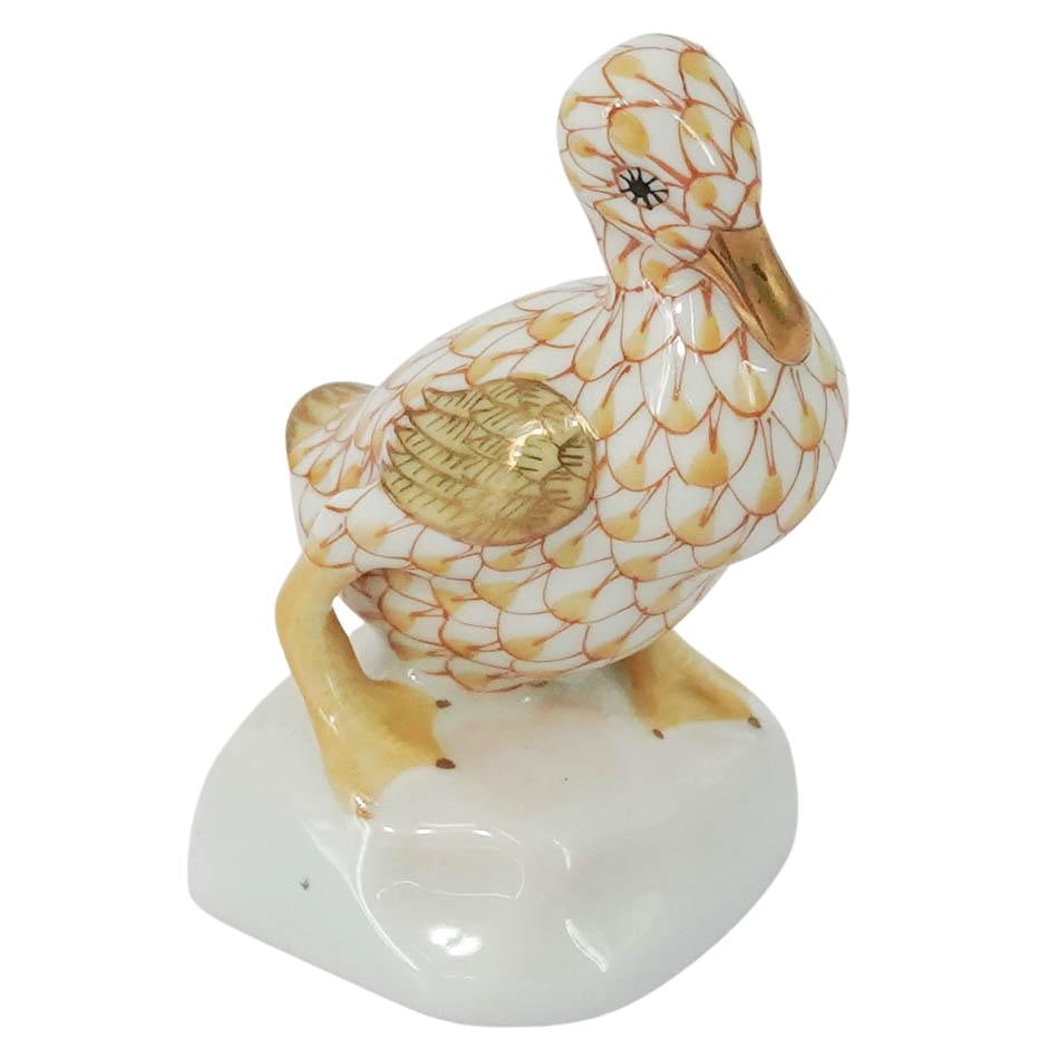 Herend Butterscotch Fishnet Porcelain Duck: Herend Butterscotch Fishnet Porcelain Duck 20th century, Hungarian A miniature Herend porcelain duck figurine (number 5022) in the butterscotch fishnet color way. Marked on bottom with Herend hallmark
