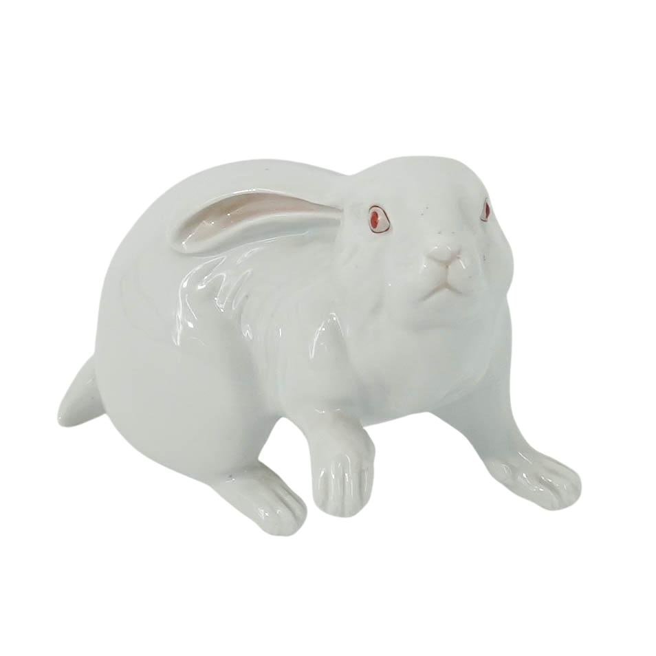 Herend Porcelain Snow White Rabbit: Herend Porcelain Snow White Rabbit 20th century, Hungarian Herend porcelain "snow white" rabbit figurine, number 5335. Marked on bottom with Herend hallmarks and incised marks. H 4.125" x L 5.25" x W 