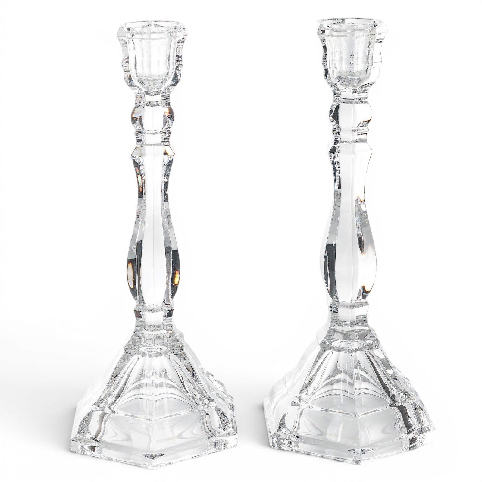 Pair of Tiffany & Co. Crystal Candlestick Holders: Pair of Tiffany & Co. Crystal Candlestick Holders Late 20th Century, Germany. Pair of Tiffany & Co. Crystal Candle Holders. Elegant cut crystal candlesticks featuring faceted stems and stepped square 