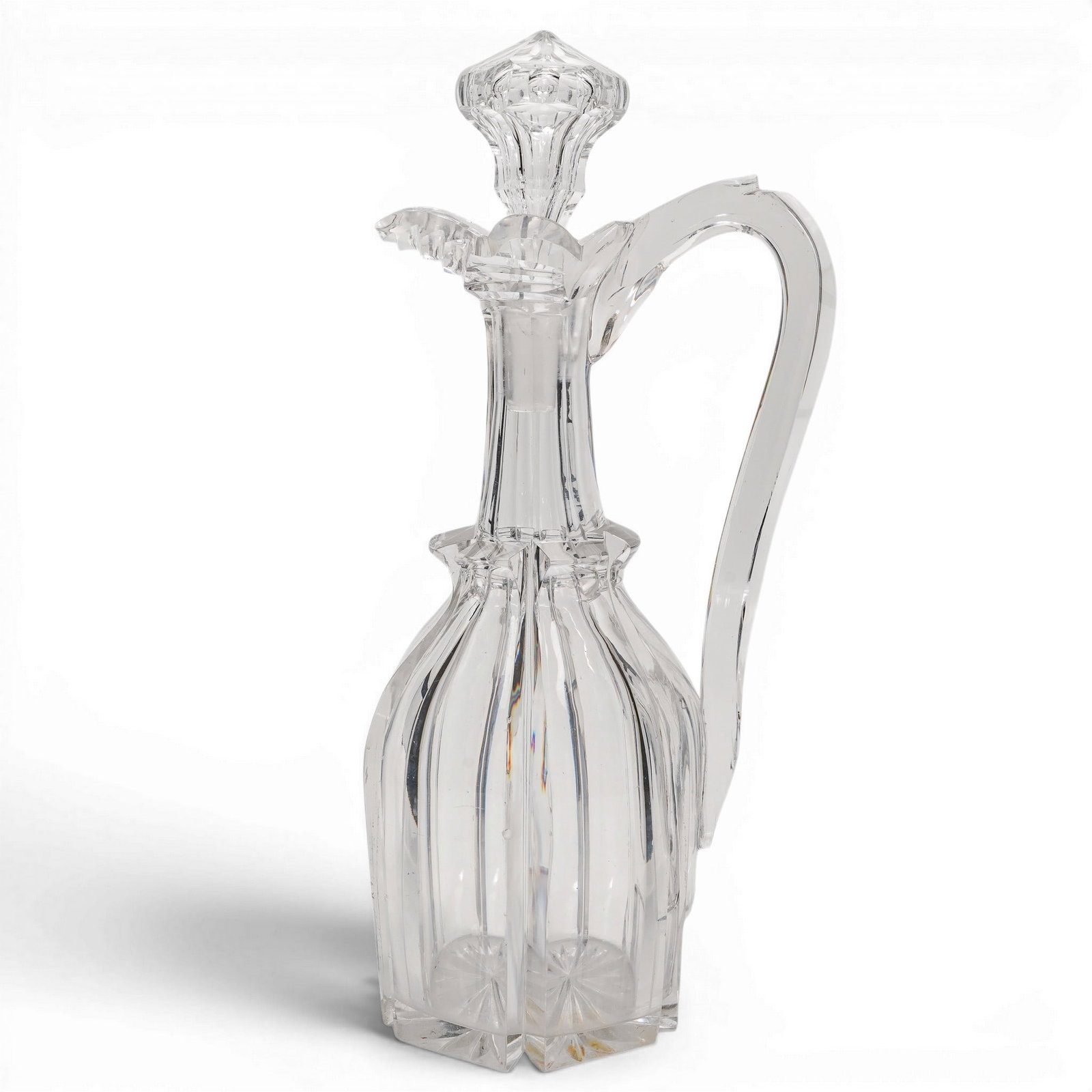 Vintage Cut Glass Decanter: Vintage Cut Glass Decanter 20th Century, USA Featuring a faceted body with radiating cut details, angular handle, scalloped rim, and fitted stopper in clear crystal-style glass. The stopper is engrave