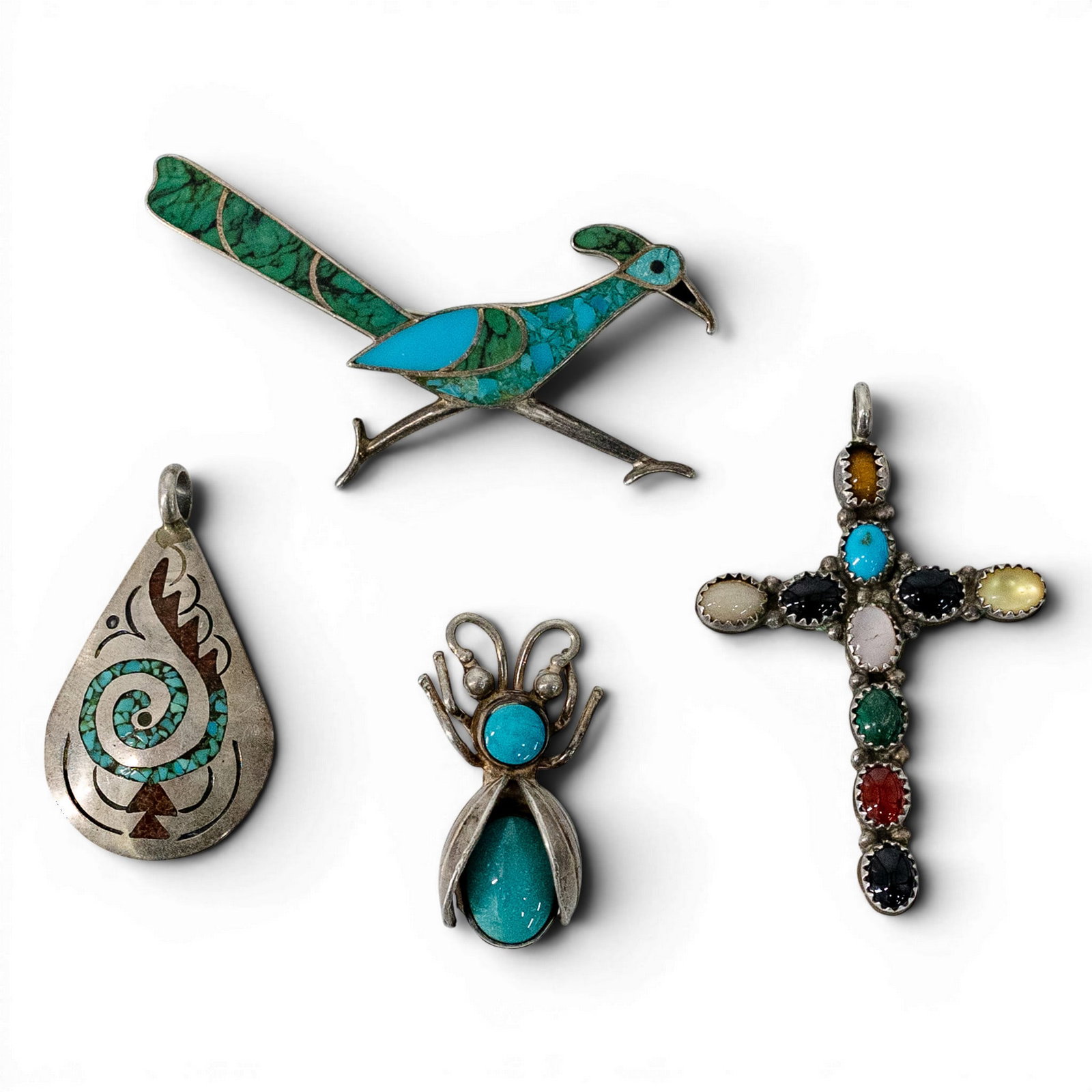 Zuni Sterling Silver Inlay Jewelry Lot: Zuni Sterling Silver Inlay Jewelry Lot 1970s-1980s, USA Zuni sterling silver jewelry lot comprising a multi-stone cross pendant, turquoise beetle brooch/pendant, teardrop pendant with turquoise spiral