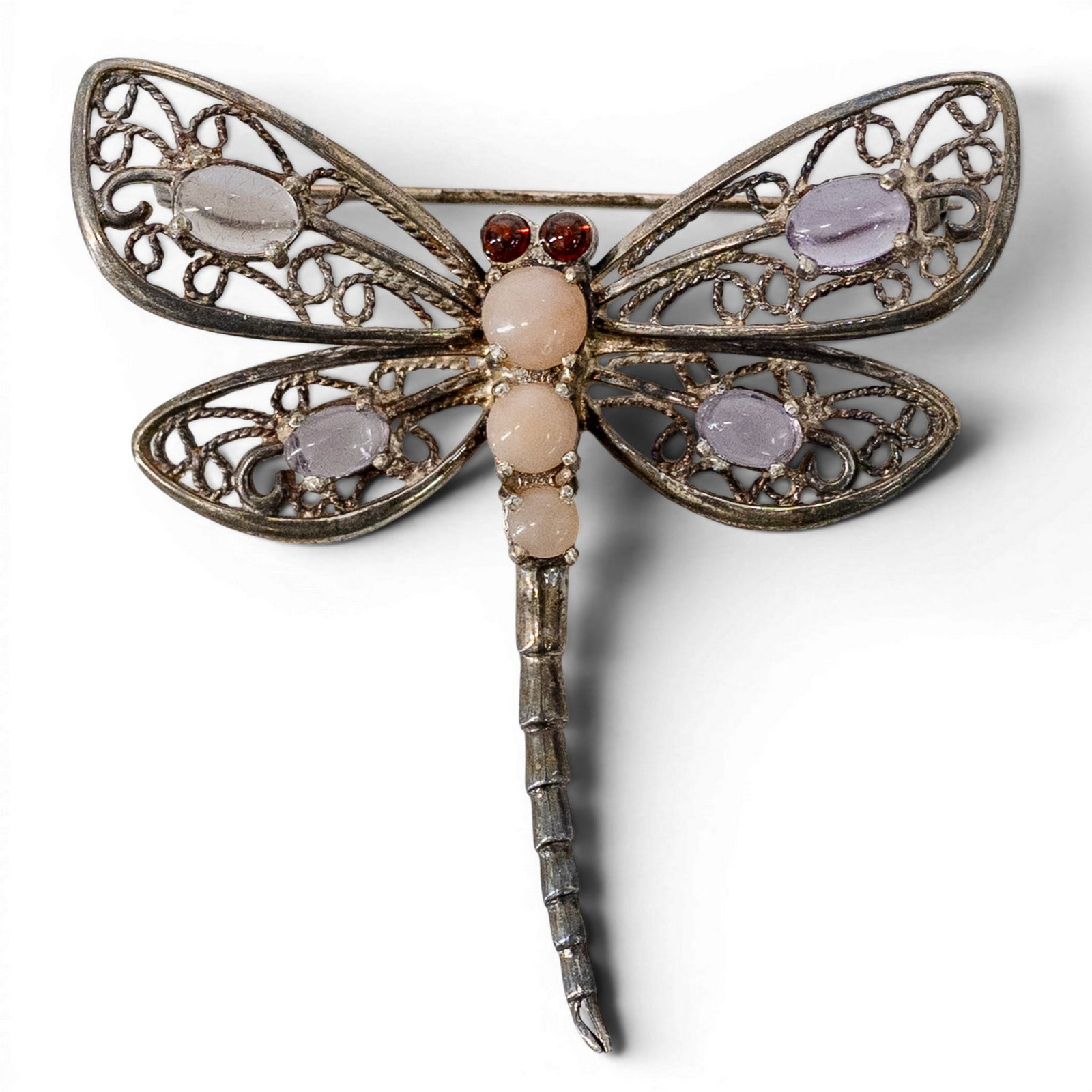 Vintage Stirling Silver & Gemstone Filigree Dragonfly Brooch: Vintage Stirling Silver & Gemstone Filigree Dragonfly Brooch Mid-late 20th century Vintage dragonfly brooch in silver-tone openwork filigree form with hinged pin back and catch. Set with assorted cabo