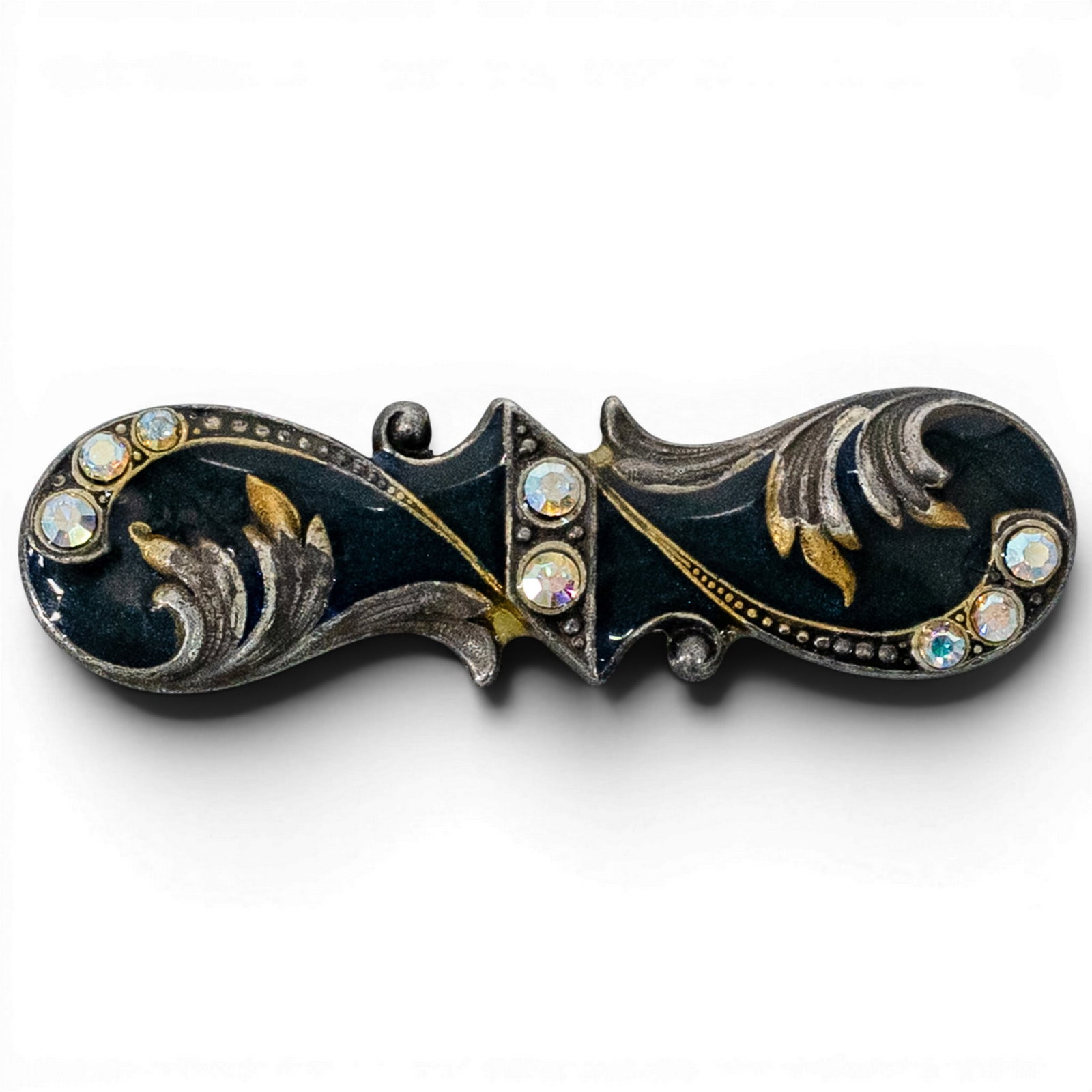 Art Nouveau Black Enamel & Rhinestone Bar Brooch: Art Nouveau Black Enamel & Rhinestone Bar Brooch Mid-late 20th century Decorative costume jewelry bar brooch with black enamel panels, silver-tone scroll detailing, gold-tone accents, and clear aurora