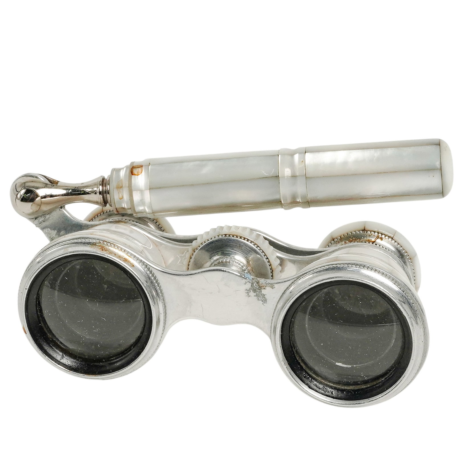 Victorian French Colmont MOP & Silver Tone Opera Glasses: Victorian French Colmont MOP & Silver Tone Opera Glasses Late 19th to early 20th Cent., French This lorgnette-style piece features a silver-toned metal frame clad in genuine mother-of-pearl panels. It