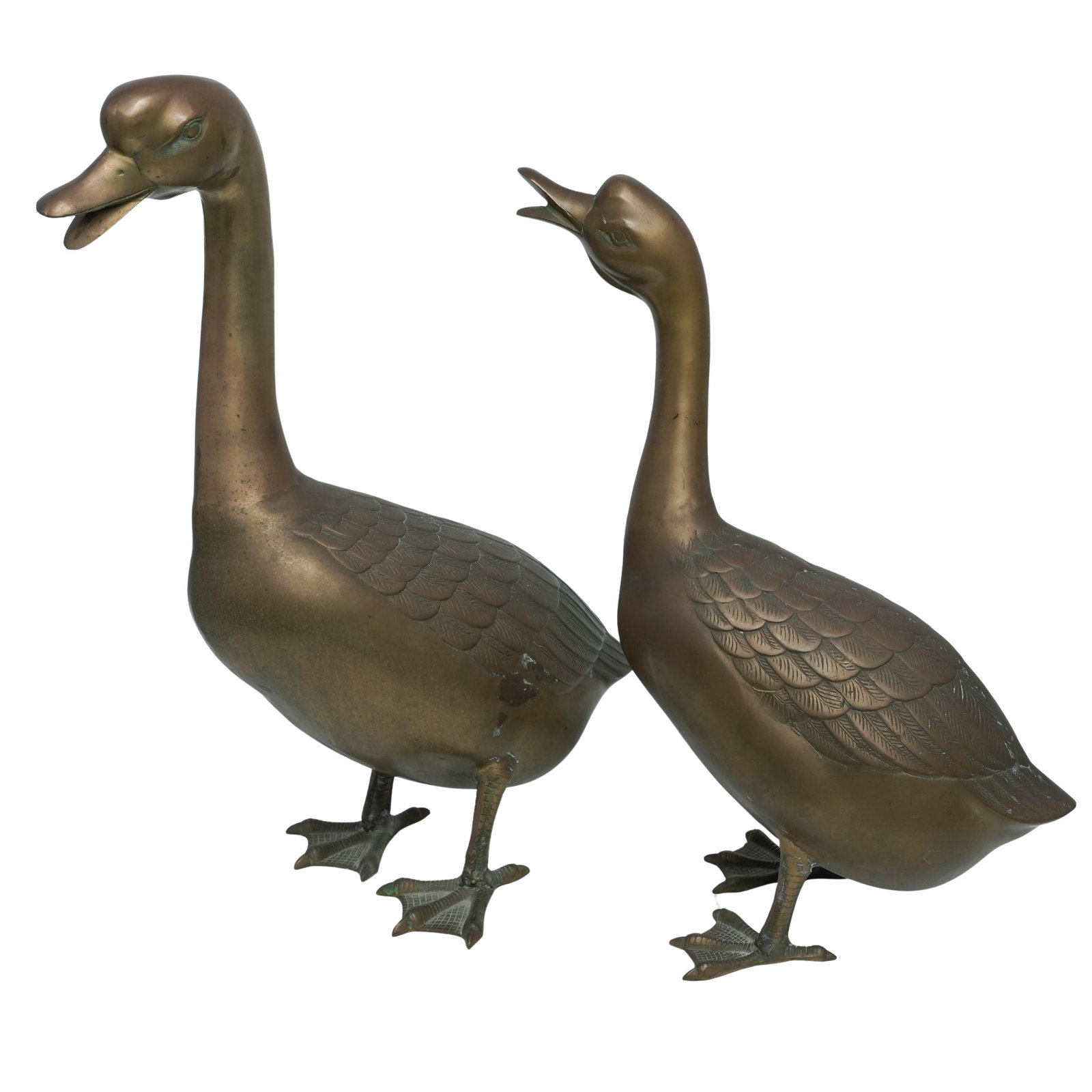 (2pc) Vintage Hollywood Regency Style Brass Goose Figurines: (2pc) Vintage Hollywood Regency Style Brass Goose Figurines Mid 20th Cent. Vintage Hollywood Regency style brass goose figurines cast in heavy solid brass, showcasing a naturally aged, dark brown pati