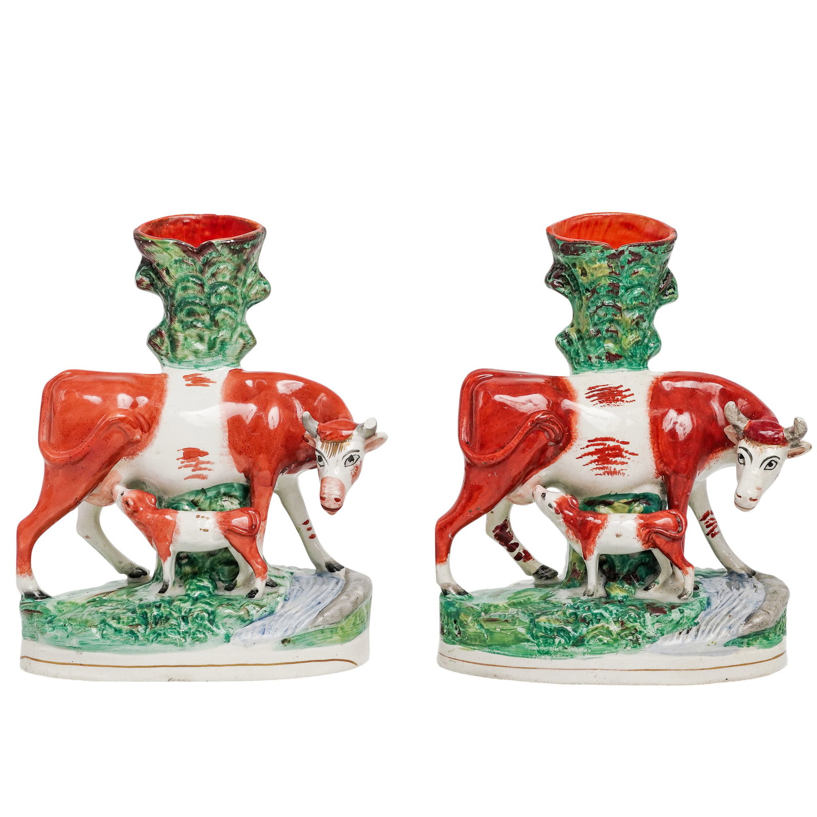 Antique Pair Staffordshire Cow Vases: Antique Pair Staffordshire Cow Vases Mid-19th Century, England Each modeled as a cow and calf in a pastoral landscape with spill vase rising from the back, hand-painted in polychrome glazes in the tra