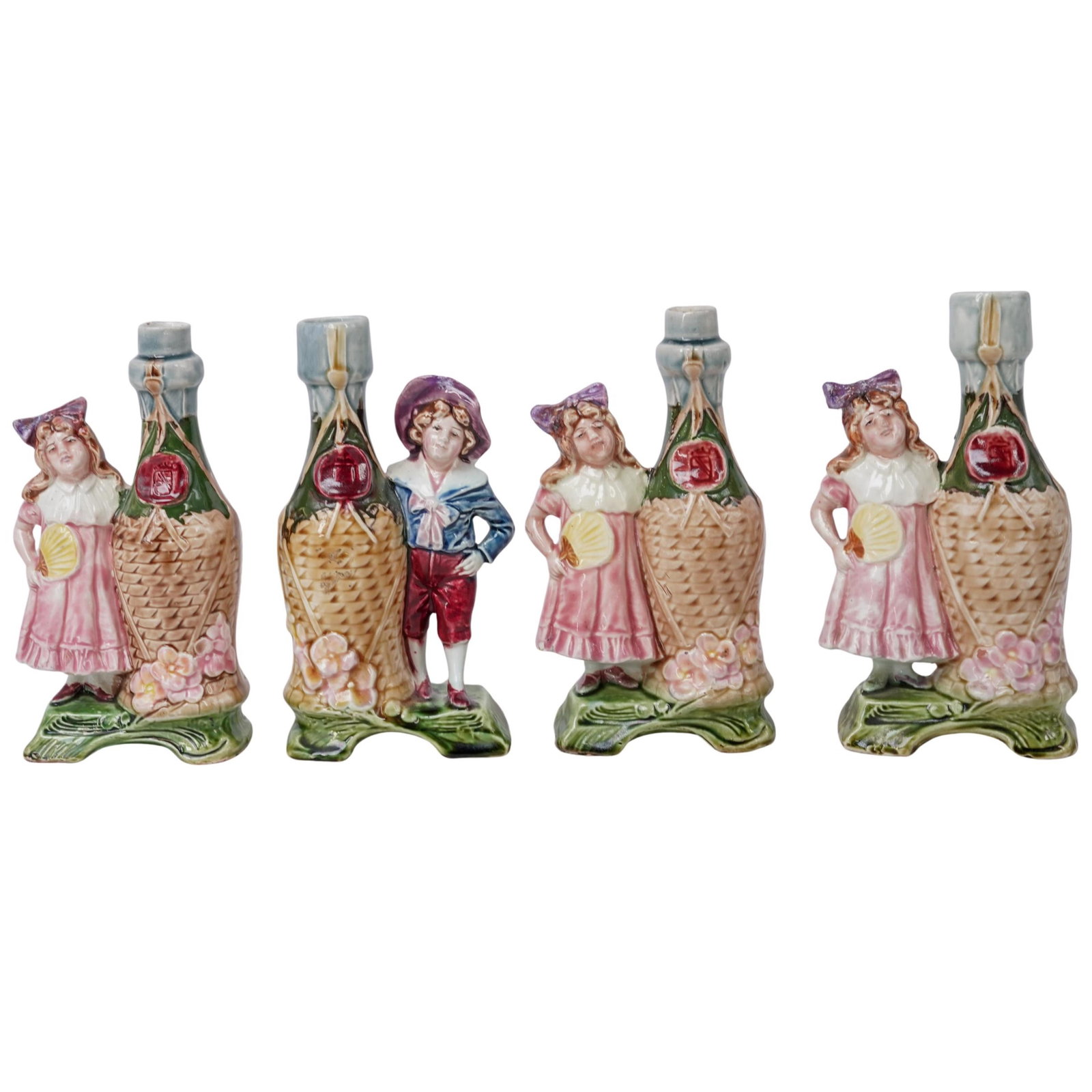 (4 Pc) Majolica Wine Bottle Candle Holders: (4 Pc) Majolica Wine Bottle Candle Holders Early 20th c., Italy Antique Majolica figural candle holders featuring a boy in a purple hat and three girls in turn-of-the-century dress holding yellow fans