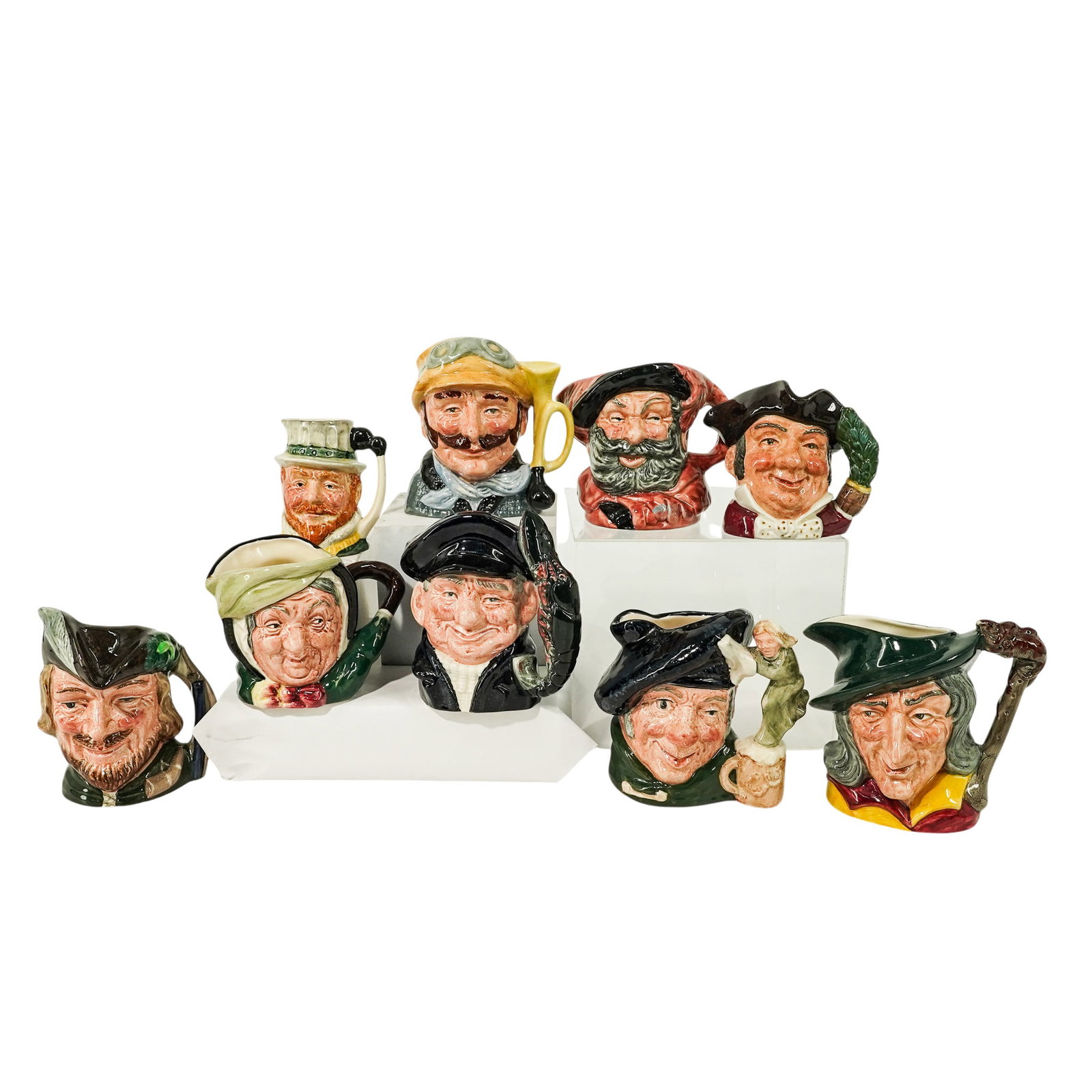 (9pc) Royal Doulton, Lancaster & Sandland Porcelain Mugs Collection: (9pc) Royal Doulton, Lancaster & Sandland Porcelain Mugs Collection Mid 20th Cent., English A collection of nine Royal Doulton, Lancaster & Sandland porcelain mugs. The group includes: (1) Veteran Mot