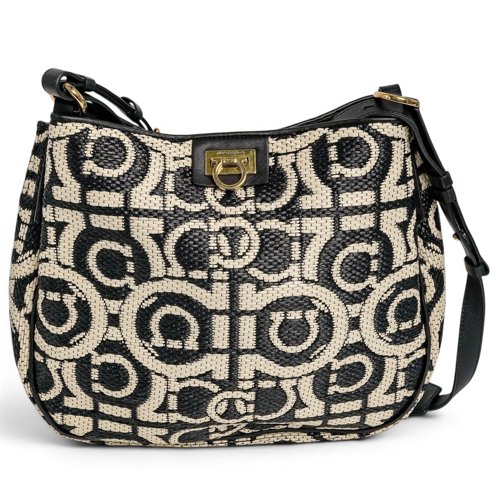 Ferragamo Gancini Raffia Hobo Bag: Ferragamo Gancini Raffia Hobo Bag Late 20th Century, Italy. A Salvatore Ferragamo “Gancini” hobo bag, crafted in black and natural raffia with an allover woven monogram motif. The softly struc