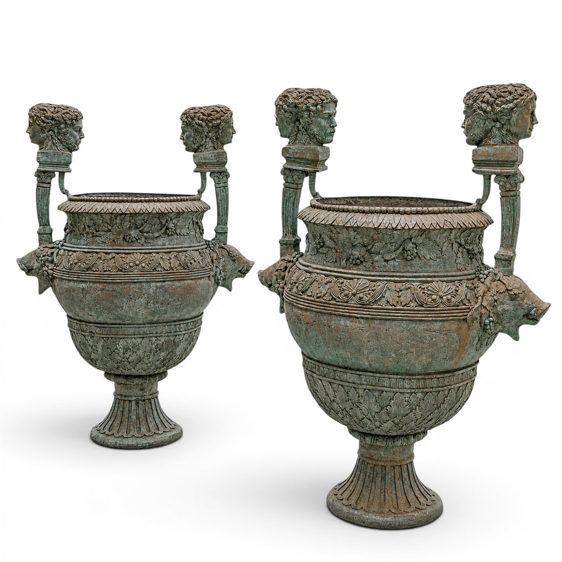Pair Neoclassical Style Bronze Garden Urn Planters: Neoclassical Style Bronze Garden Urn Planters Late 20th Cent. Pair of neoclassical style bronze garden urn planters, each of bulbous form with flared rim and pedestal base. The bodies are decorated wi