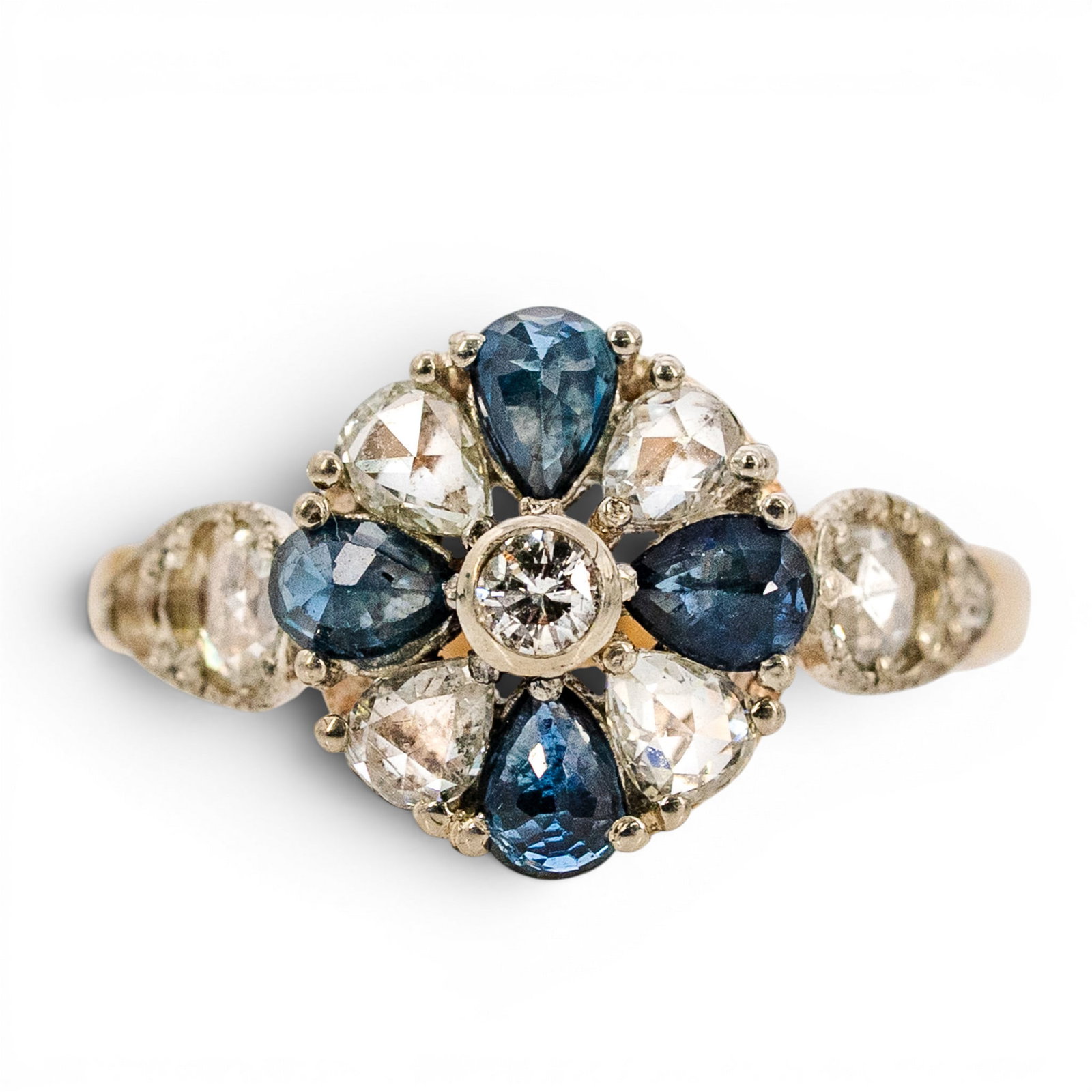 Art Deco Russian 14k Gold Sapphire & Diamond Ring: Art Deco Russian 14k Gold Sapphire & Diamond Ring Early 1900s, Russian Art Deco Russian 14k gold ring featuring a floral cluster design set with pear-cut blue sapphires weighing approximately 0.80 cts