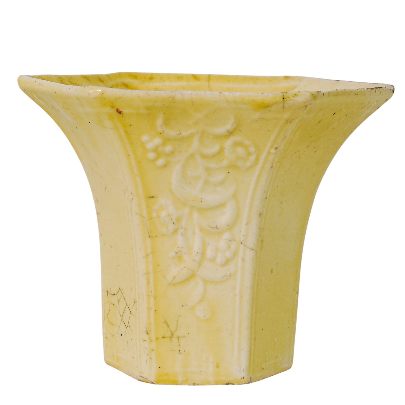 Antique Chinese Yellow Glaze Vase: Antique Chinese Yellow Glaze Vase Late 19th Century, China. Chinese Yellow-Glazed Porcelain Vase, of flared hexagonal “horn” form with molded foliate decoration and pale yellow glaze. D: 4.5" 
