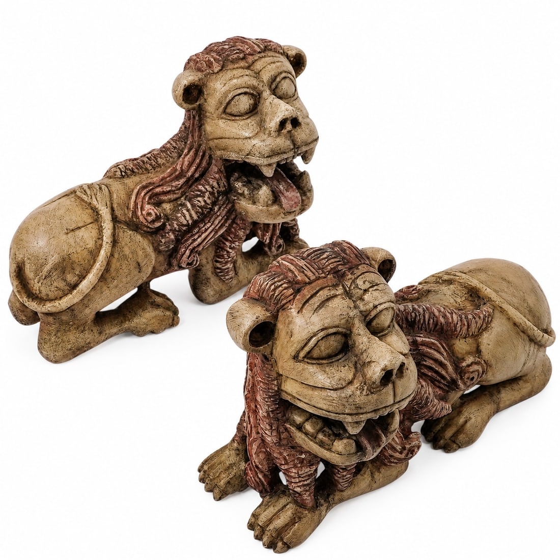 Pair Of Spanish Colonial Carved Alabaster Lions: Pair Of Spanish Colonial Carved Alabaster Lions 18th-19th c., Peru Antique Peruvian hand-carved and painted Huamanga alabaster lions featuring characteristic large eyes, gaping mouths, and textured ma