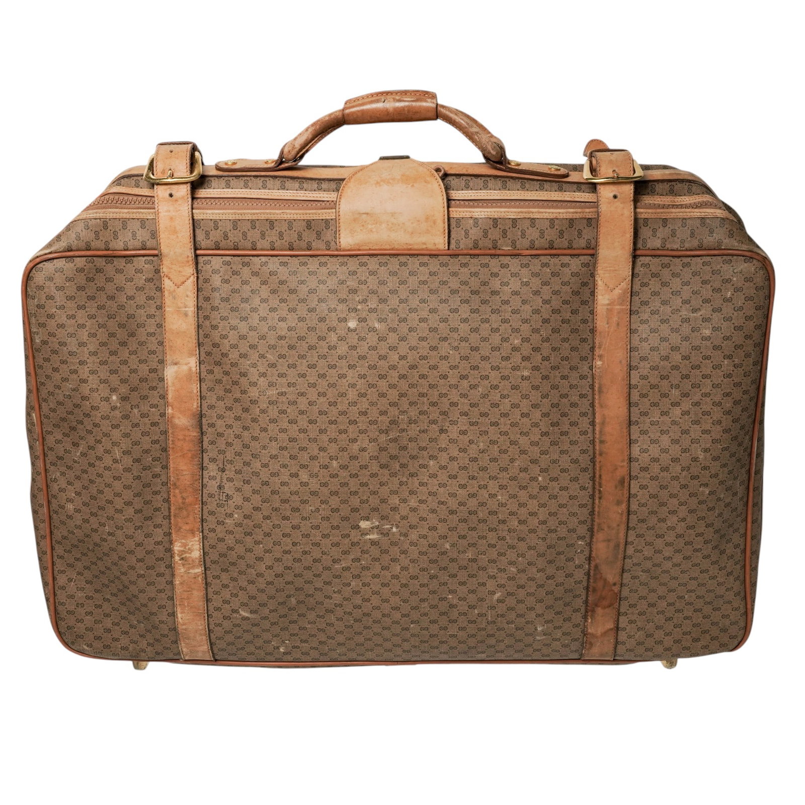 Vintage Gucci Tan Monogram Canvas Suitcase: Vintage Gucci Tan Monogram Canvas Suitcase Mid-20th Century, Italy. Vintage Gucci Monogram Suitcase. Brown GG canvas travel case with tan leather trim and handles, gold-toned hardware engraved “Gucc