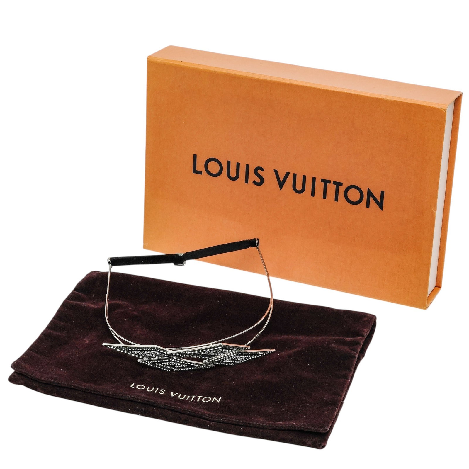Louis Vuitton Jeweled Headband with Box: Louis Vuitton Jeweled Headband with Box 20th Century, Italy. Art Deco Style Rhinestone Headband, featuring geometric zig-zag design in silver-tone metal set with clear cubic zirconia and smoky crystal