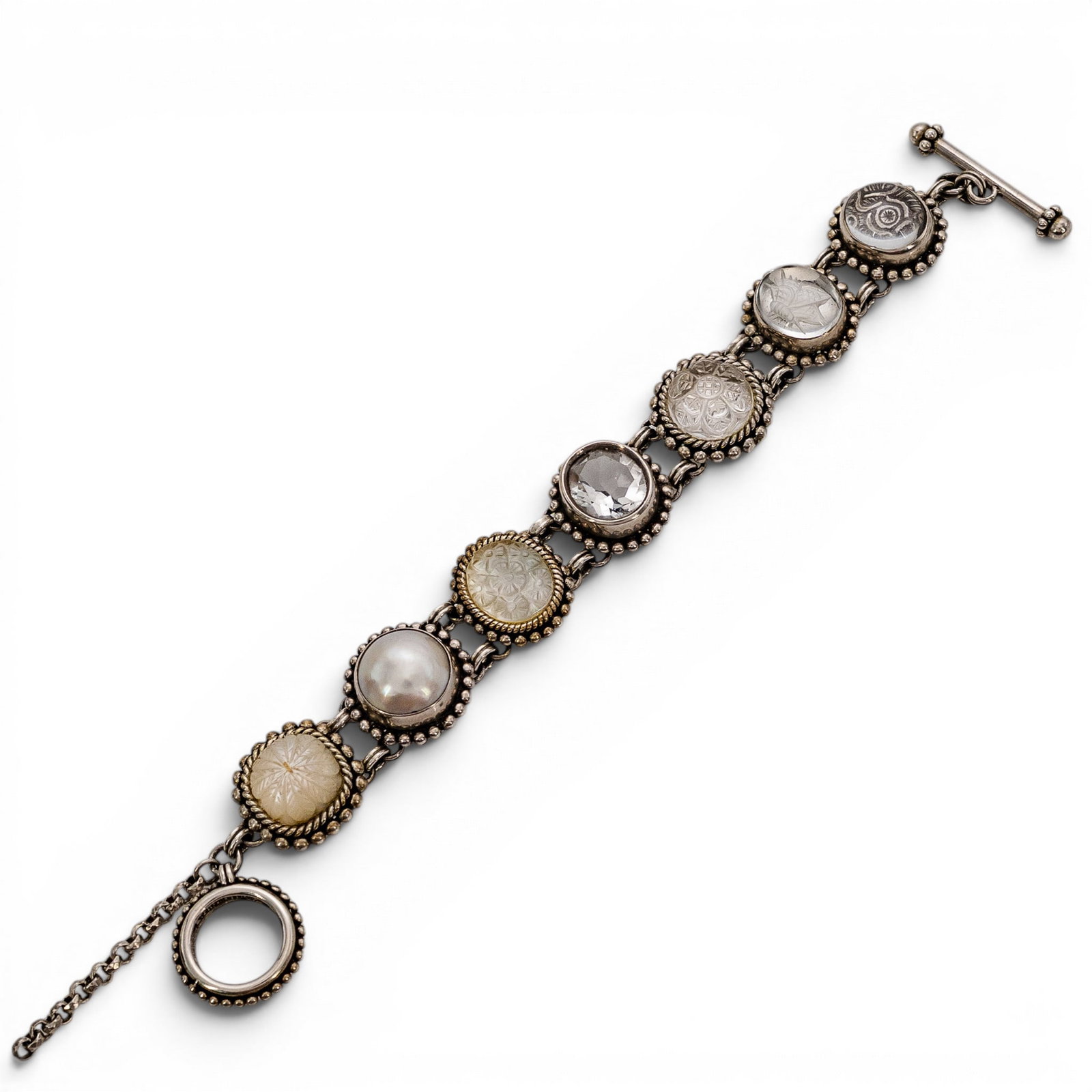 Stephen Dweck Sterling Silver Multi-Stone Intaglio Link Bracelet: Stephen Dweck Sterling Silver Multi-Stone Intaglio Link Bracelet 2000s, USA Sterling silver link bracelet composed of double-bar connected round bezel stations with beaded borders, set with mixed carv