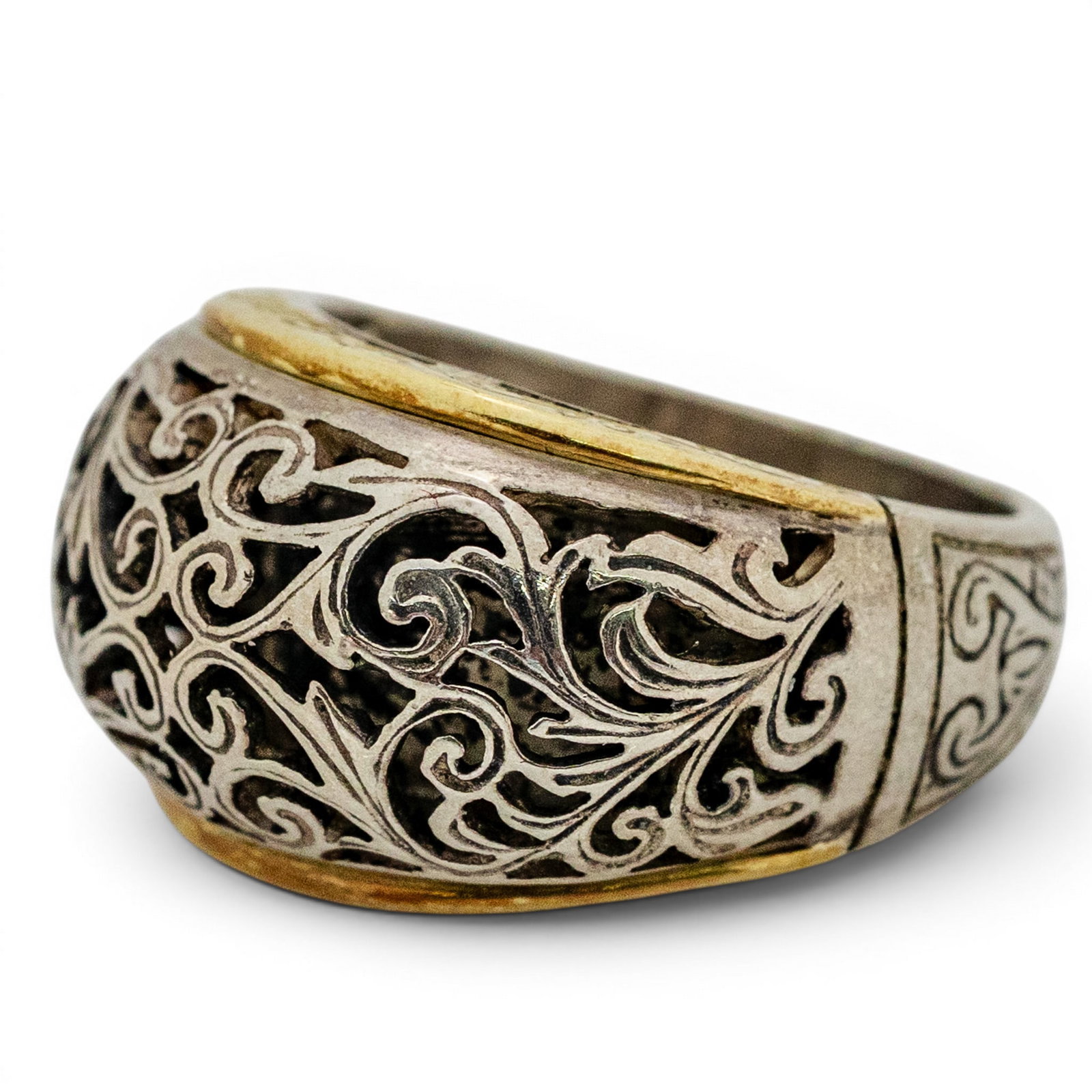 Konstantino Sterling Silver & 18k Gold Scrollwork Band Ring: Konstantino Sterling Silver & 18k Gold Scrollwork Band Ring 1990s, Greek Elegant band ring in sterling silver with pierced scroll and foliate openwork over oxidized ground, featuring an internal 18k