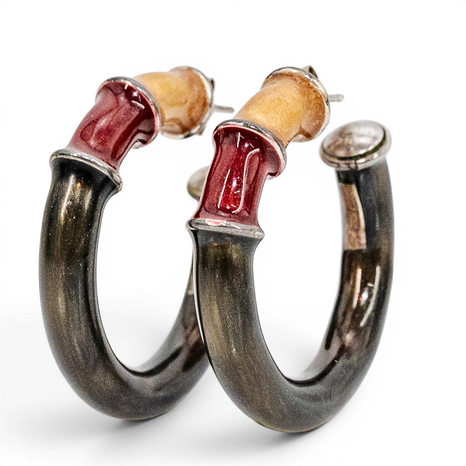 Italian Sterling Silver & Enamel Hoop Earrings: Italian Sterling Silver & Enamel Hoop Earrings 1990s, Italian Pair of sterling silver hoop earrings formed as curved tubular hoops with applied enamel segments in green, red, and gold-tone coloration,