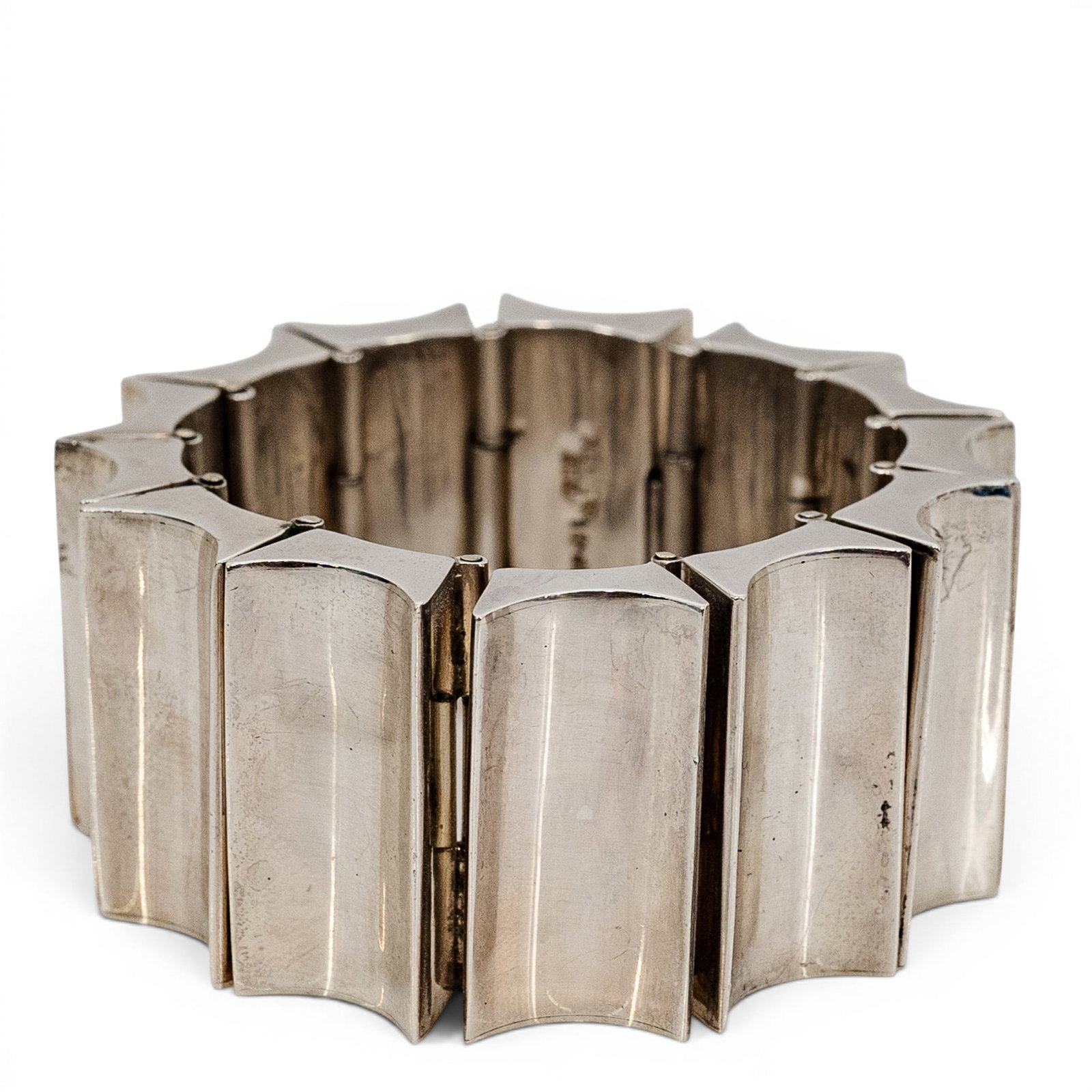 Vintage Mexican Sterling Silver Panel Bracelet: Vintage Mexican Sterling Silver Panel Bracelet 1970s, Mexican Heavy sterling silver cuff bracelet composed of articulated geometric panel links with curved, sculptural surfaces joined by pin connectio