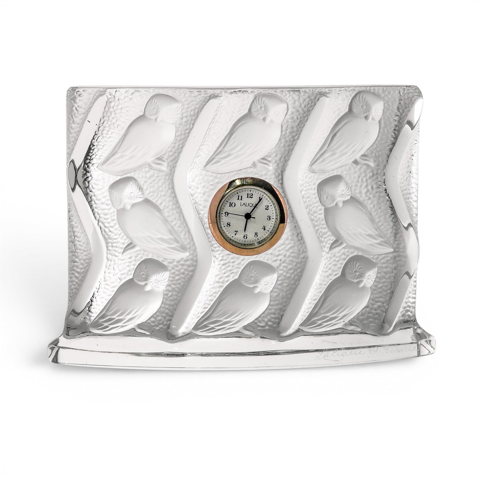 Lalique "Hulotte" Owl Crystal Table Clock: Lalique "Hulotte" Owl Crystal Table Clock 20th century, French The clock is crafted from hand-finished crystals, utilizing Lalique's signature contrast between clear and frosted textures. The body of 