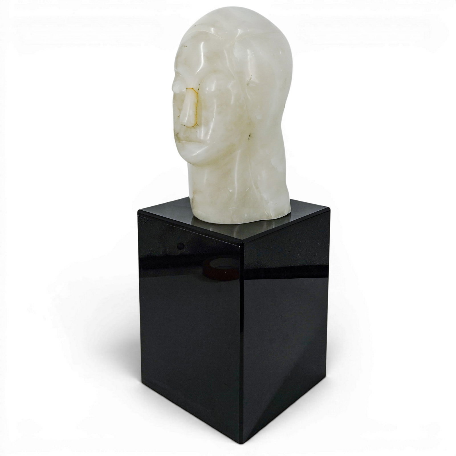 Vintage Carved Alabaster Bust Sculpture: Vintage Carved Alabaster Bust Sculpture Mid-20th Century, Continental. Vintage carved alabaster bust sculpture depicting a stylized human figure with abstract facial features. Executed in polished whi