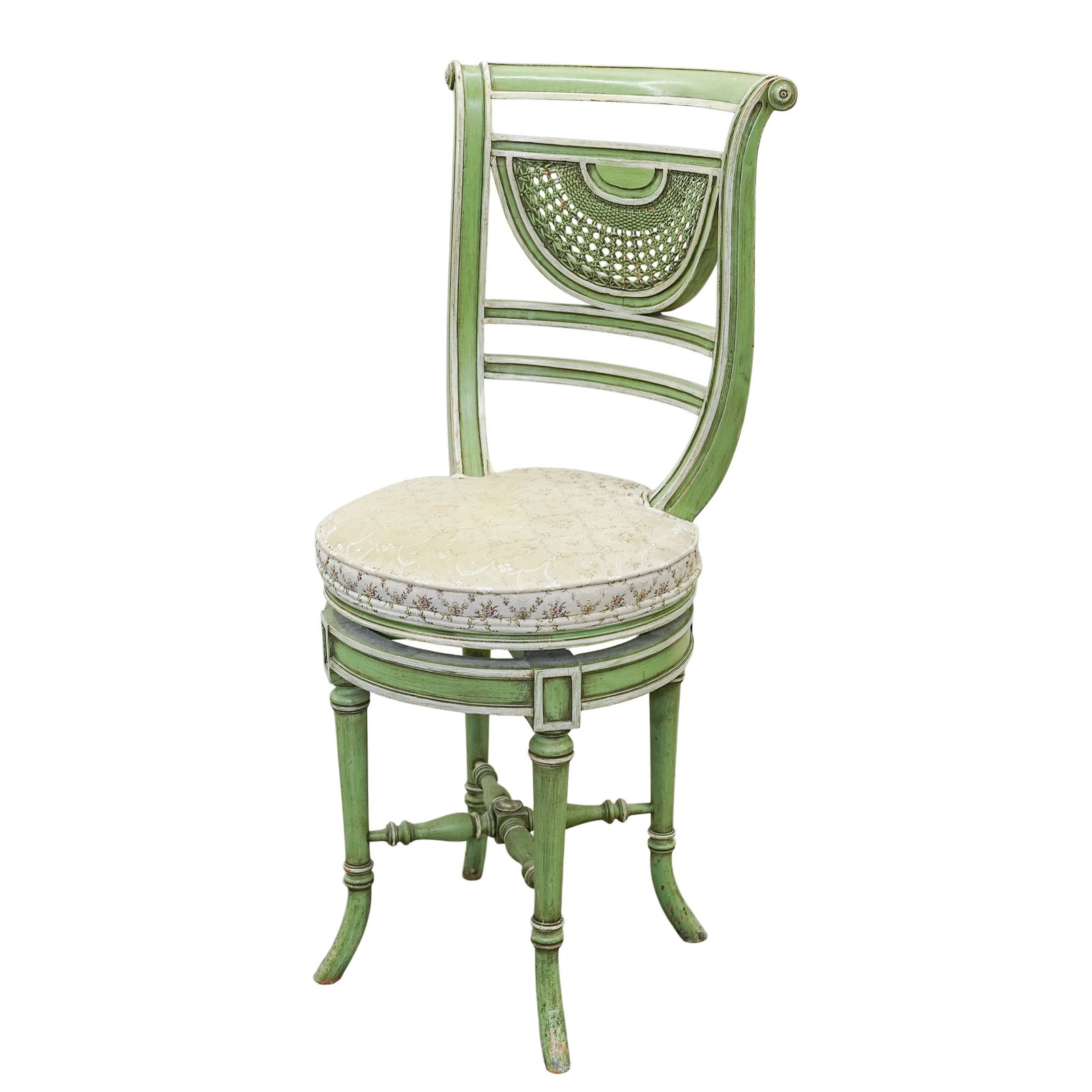 Antique French Regency Style Cane Chair: Antique French Regency Style Cane Chair Early-Mid 20th century, French a French Regency-style side chair. Hand-painted light green finish and white linear accents. The backrest is centered by a finely