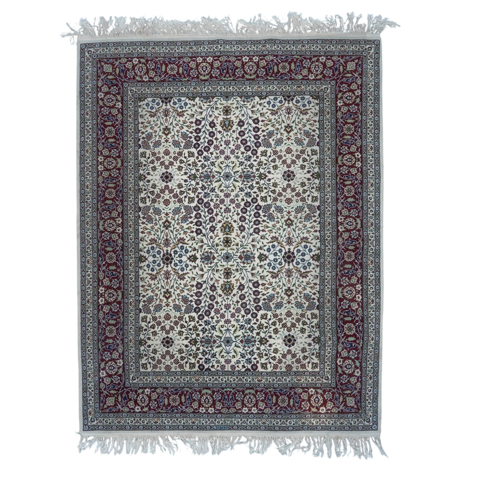 Turkish Hereke Wool Rug: Turkish Hereke Wool Rug 20th century, Turkish A large Turkish Hereke wool area rug featuring an intricate all-over floral pattern typical of Hereke rugs, characterized by symmetrical, detailed motifs 