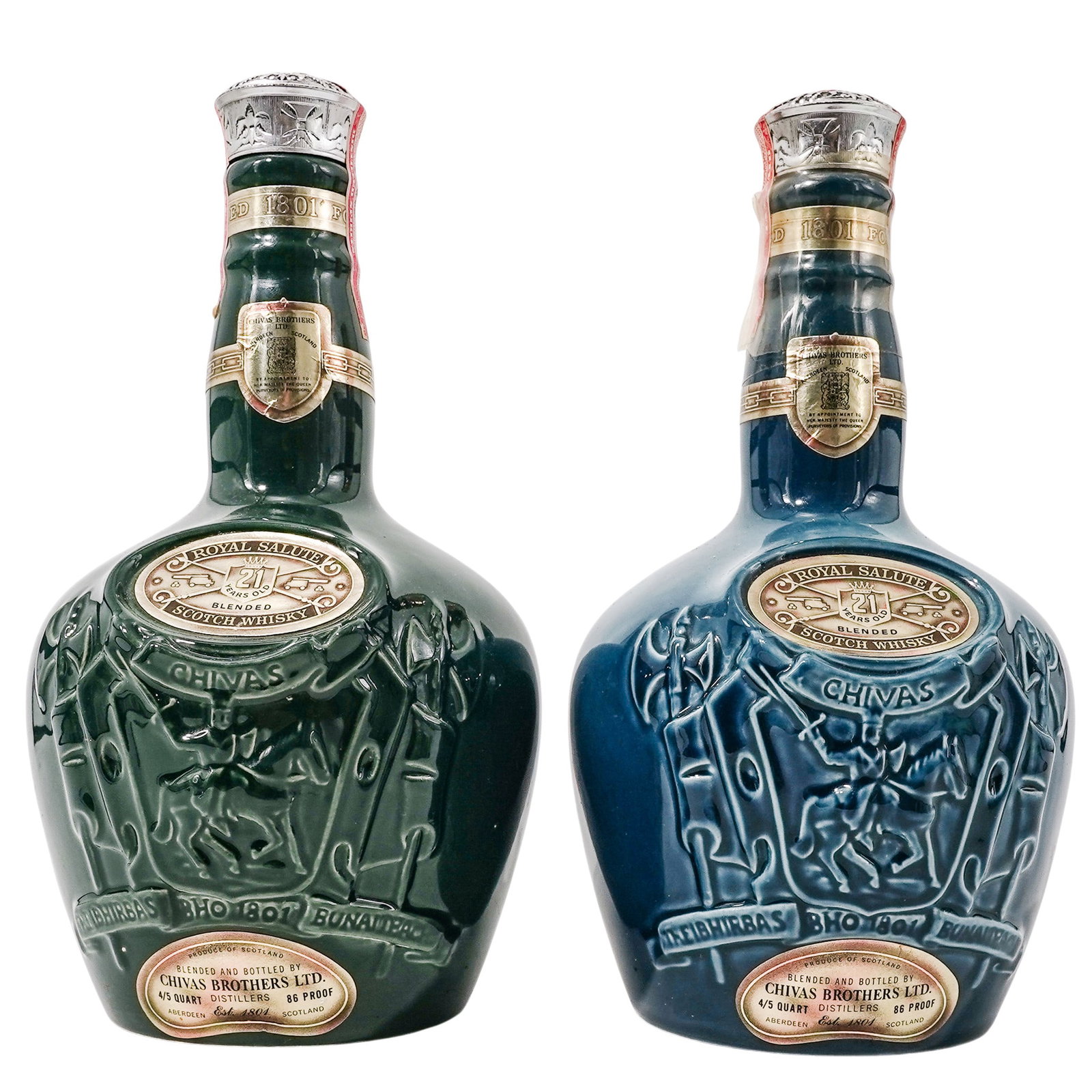 (2 pc) Chivas Brothers Royal Salute 21 Year Old Blended Scotch Whiskey Bottles: (2 pc) Chivas Brothers Royal Salute 21 Year Old Blended Scotch Whiskey Bottles 20th century, England These Sapphire blue and Emerald green bottles are handcrafted porcelain flagons that were originall