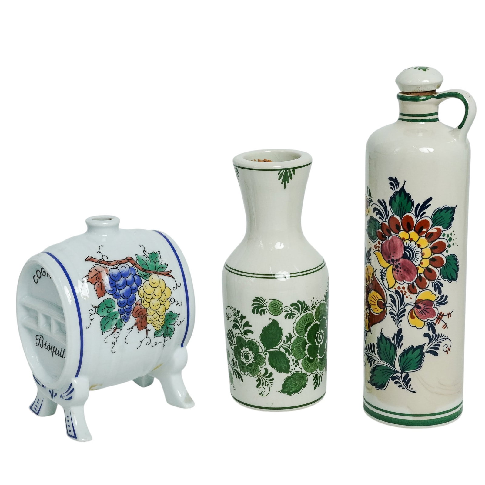 (3 Pc) Delft & Limoges Porcelain Decanters: (3 Pc) Delft & Limoges Porcelain Decanters Mid-20th Century, Continental. Group of three porcelain decanters, including two Delft polychrome examples marked “Delft Polychroom Made in Holland Handwer