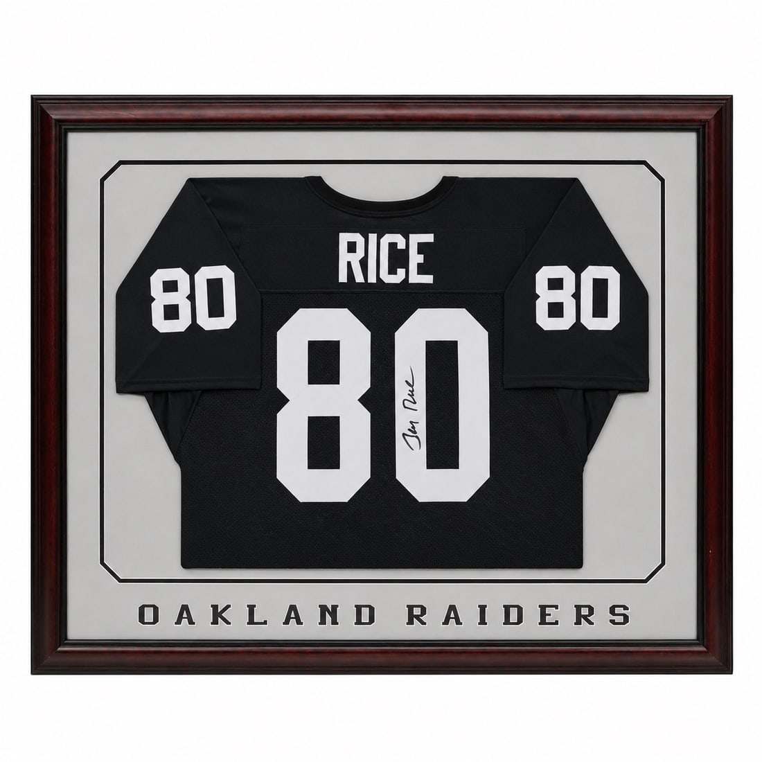 Jerry Rice Signed Oakland Raiders NFL Framed Jersey with/ COA: Jerry Rice Signed Oakland Raiders NFL Framed Jersey with/ COA c. 2002, USA There is a handwritten signature in silver ink located directly on the large number "0" on the back of the jersey. Comes with