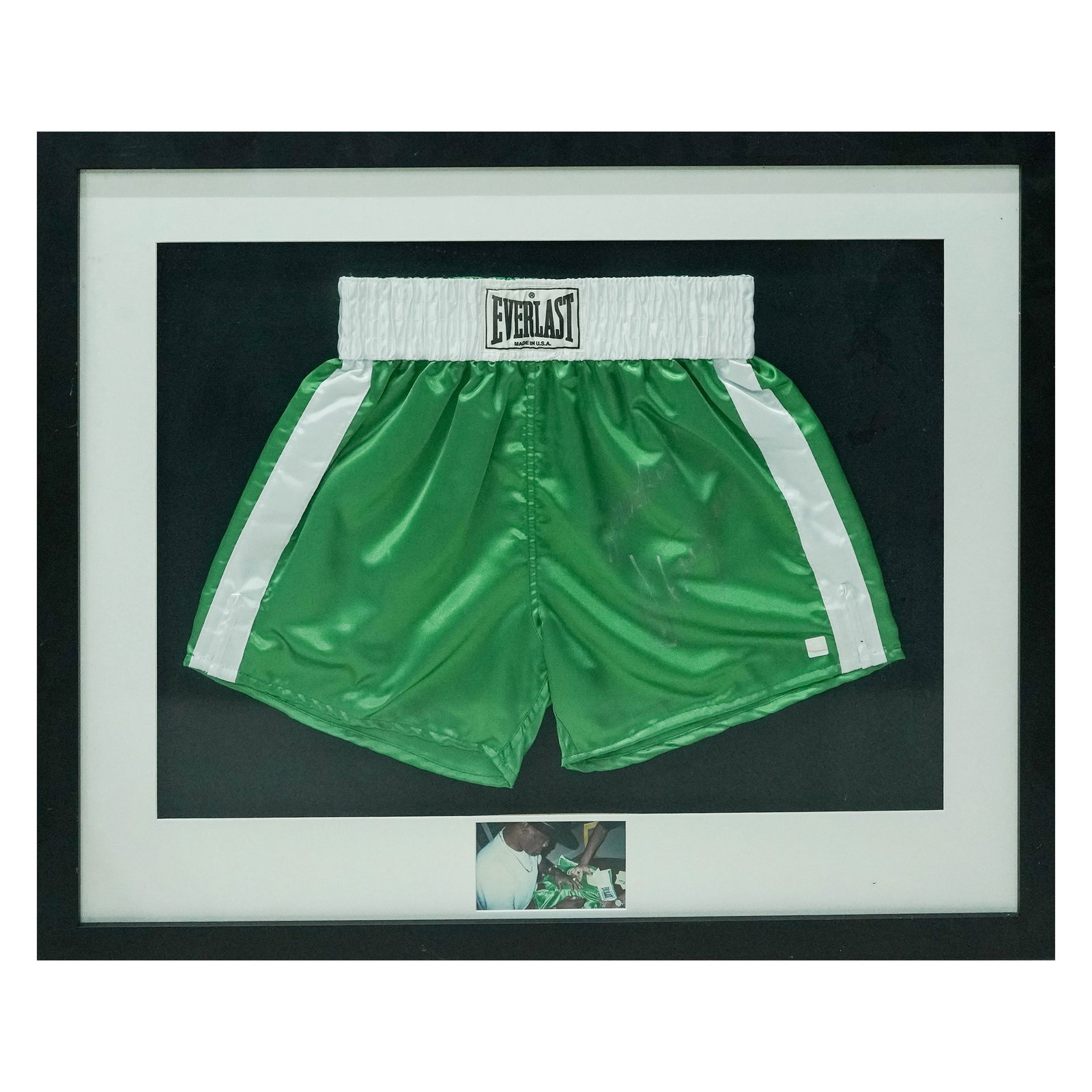 Joe "Smoking" Frazier's Everlast Boxing Trunks Signed with/ COA: Joe "Smoking" Frazier's Everlast Boxing Trunks Signed with/ COA 20th century, USA Green & white were the signature colors of heavyweight boxing legend Joe "Smoking" Frazier, and these trunks are often