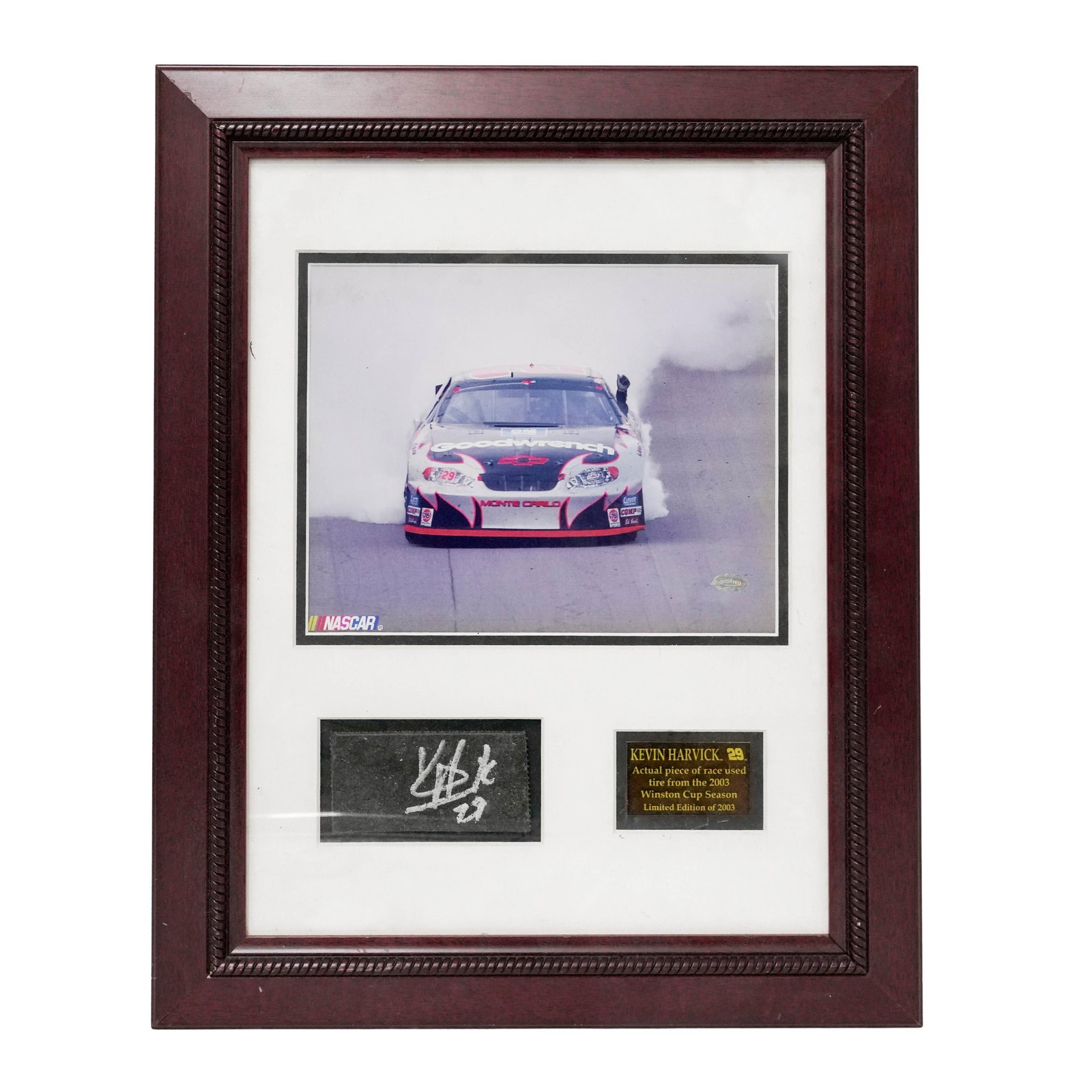 Kevin Harvick (American, 1975-) Nascar Autographed Tire: Kevin Harvick (American, 1975-) Nascar Autographed Tire 2003, USA Featuring a signed piece of race-used tire attributed to Kevin Harvick, accompanied by a NASCAR racing photograph and presentation pla