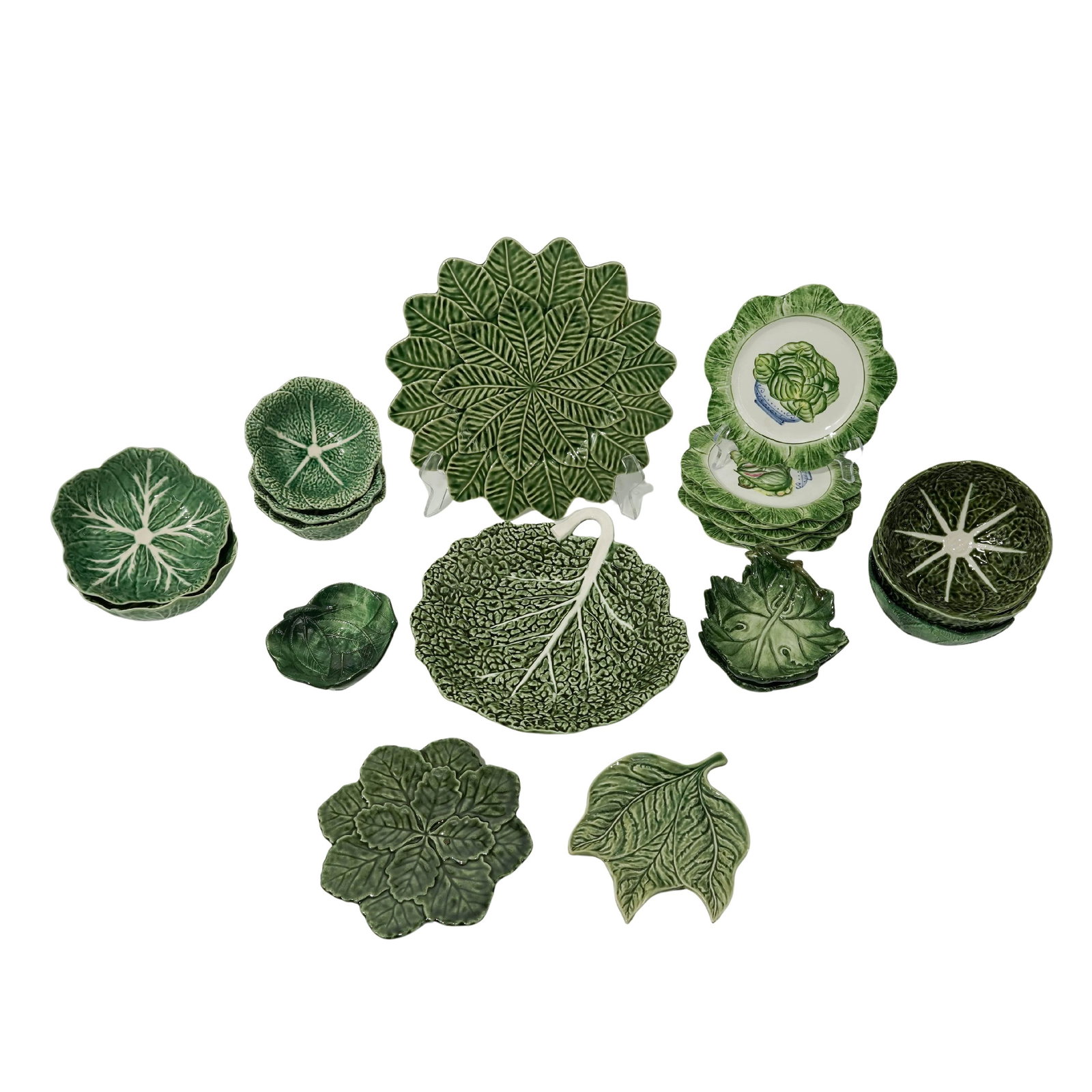 (22pc) Portuguese & Italian Majolica Cabbage Ware: (22pc) Portuguese & Italian Majolica Cabbage Ware 20th Cent.,, Portuguese, Italian This collection features a curated selection of majolica-style cabbage ware, a whimsical genre of botanical pottery t