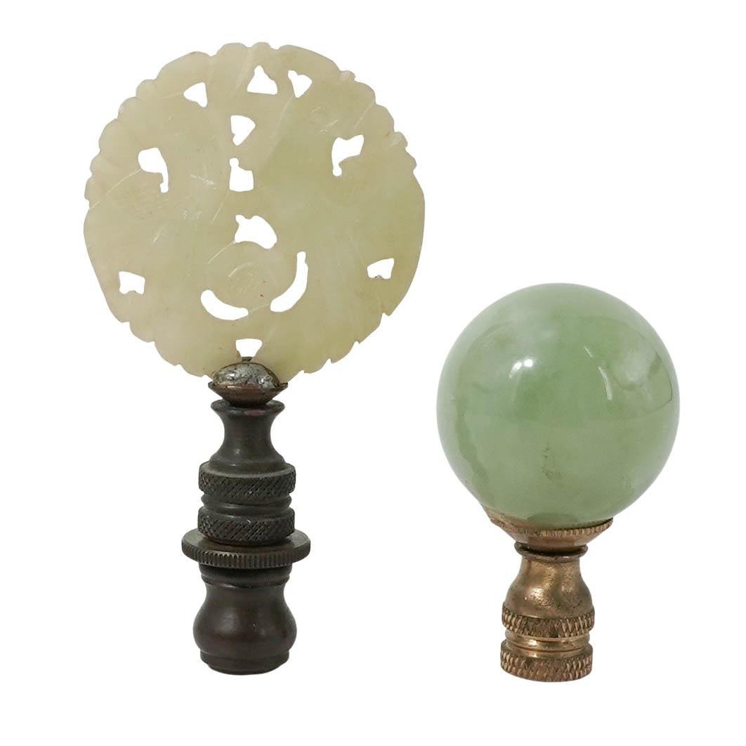 (2 Pc) Chinese Jade Lamp Finials: (2 Pc) Chinese Jade Lamp Finials 20th c., China Two carved jade lamp finials, one featuring a smooth orb and the other a round openwork bird motif. L: 3.65" W: 2" L: 2.25" W: 1.5"