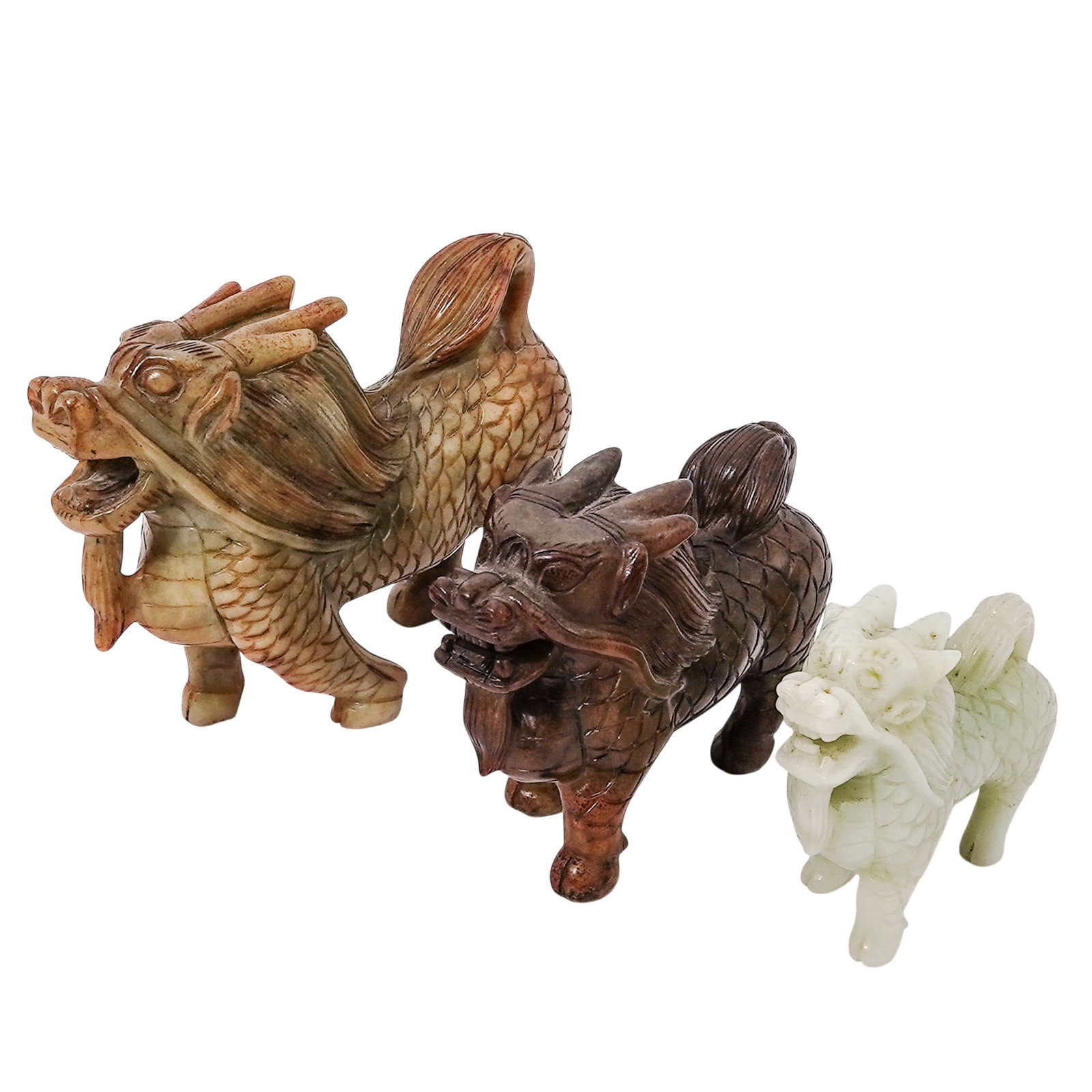(3 Pc) Chinese Jade Qilin Beasts: (3 Pc) Chinese Jade Qilin Beasts China Three antique Chinese hand-carved highly detailed Jade mythical Qilin beasts. H: 4.5" W: 1.75" L: 6" H: 3.5" W: 1.75" L: 5" H: 3" W: 1.35" L: 3.5"