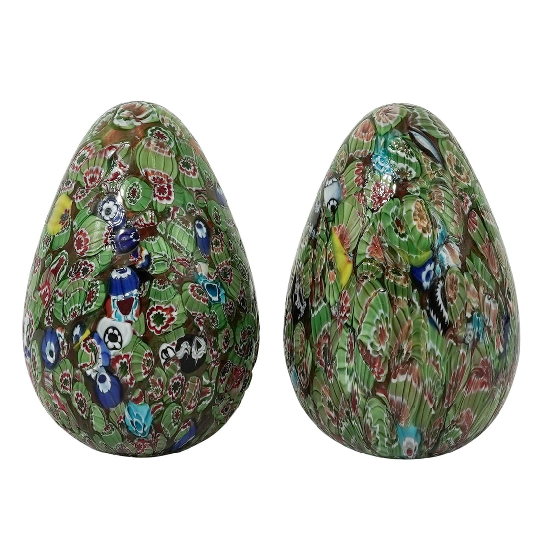 Pair Of Murano Style Glass "Millefiori" Eggs: Pair Of Murano Style Glass "Millefiori" Eggs 20th Cent., Italy These vintage millefiori-style glass eggs are pieces that showcase the classic "thousand flowers" technique. Each egg features a dense mo