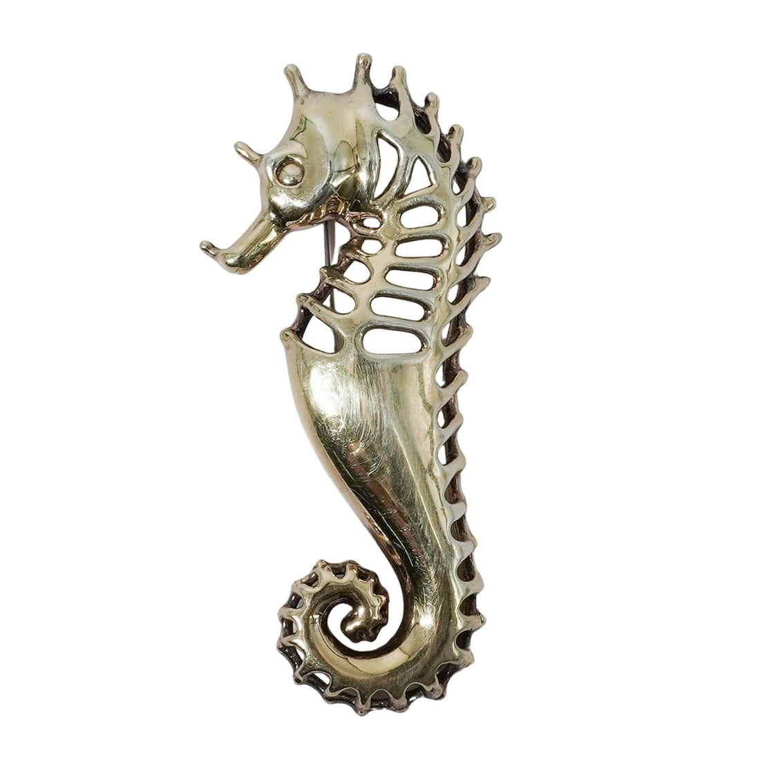 Sterling Silver Reticulated Seahorse Pendant Brooch: Sterling Silver Reticulated Seahorse Pendant Brooch Late 20th c. Vintage gold vermeil sterling silver openwork seahorse pendant brooch. It is etched with a signature that looks like "Han Huhasa" and m