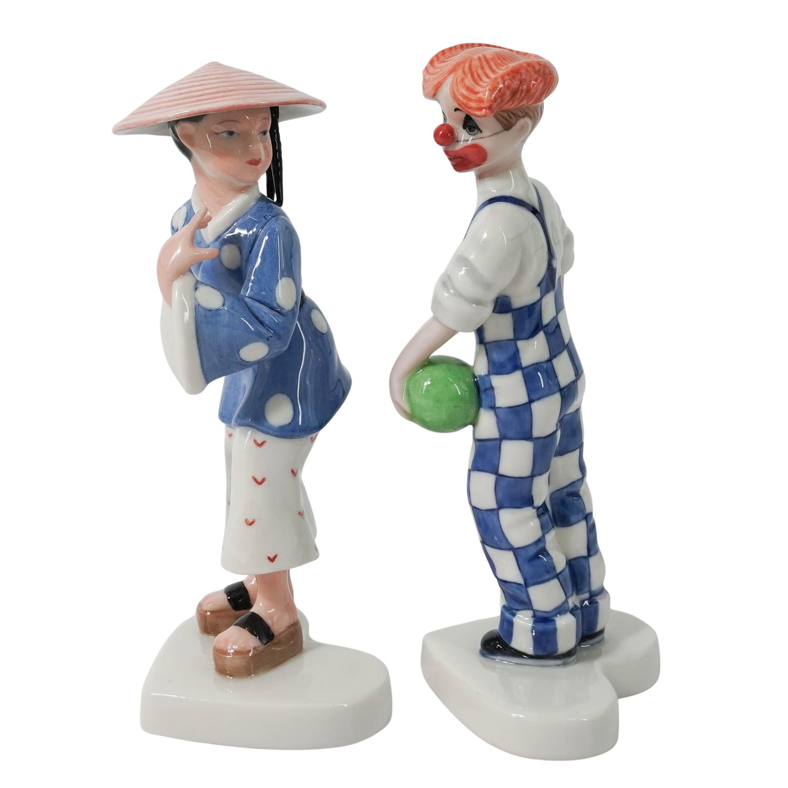 (2 Pc) Royal Copenhagen Porcelain Figurines: (2 Pc) Royal Copenhagen Porcelain Figurines 20th century, Denmark (2 Pc) Royal Copenhagen from "Dressed up Children" series designed by Katarzyna Tomalak porcelain clown # 047 & Chinese girl figurines