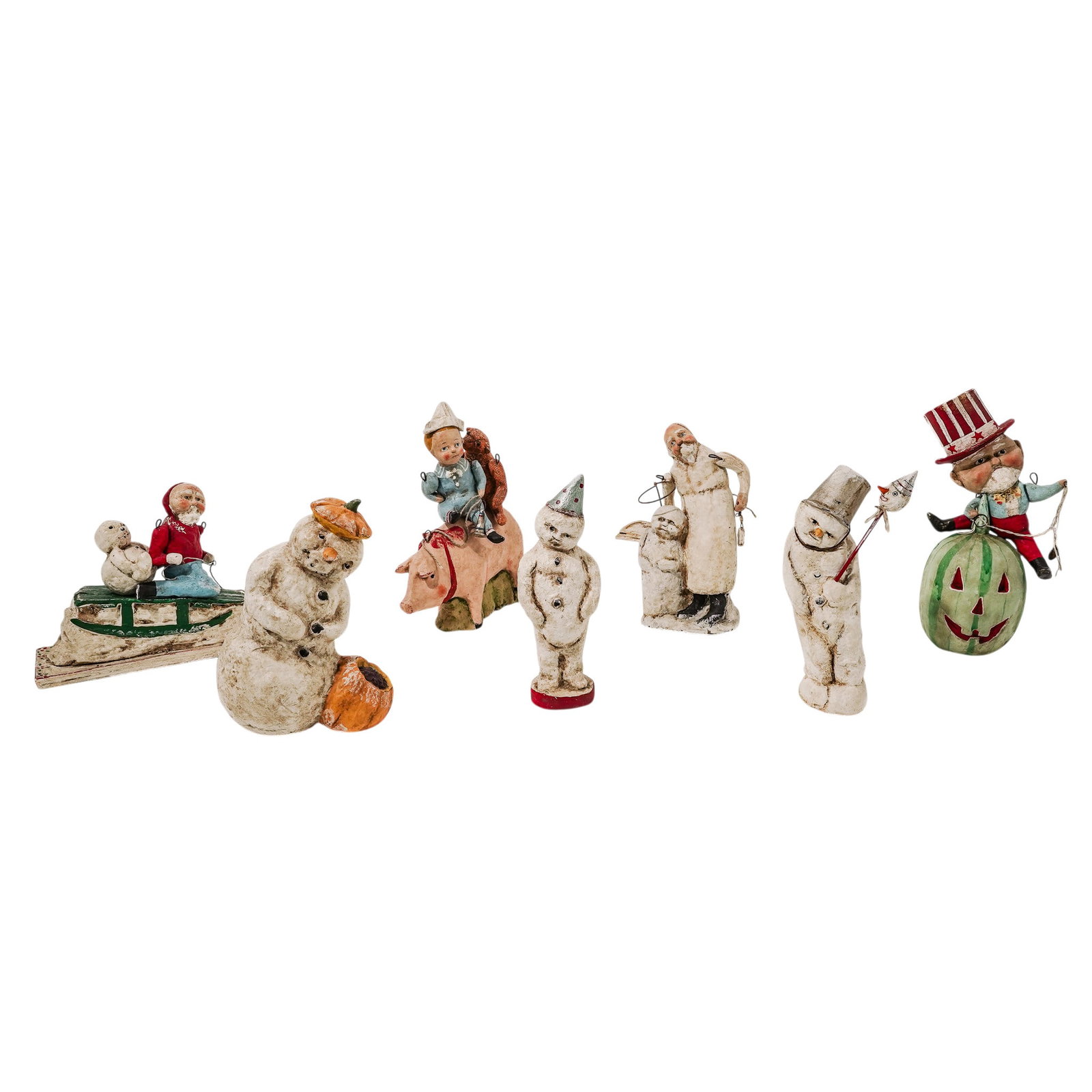 (7pc) Debbee Thibault (American, 20th Cent.) Folk Art Group: (7pc) Debbee Thibault (American, 20th Cent.) Folk Art Group 20th Cent., American This collection features a rare group of original, limited-edition folk art figurines made of paper composition by the 