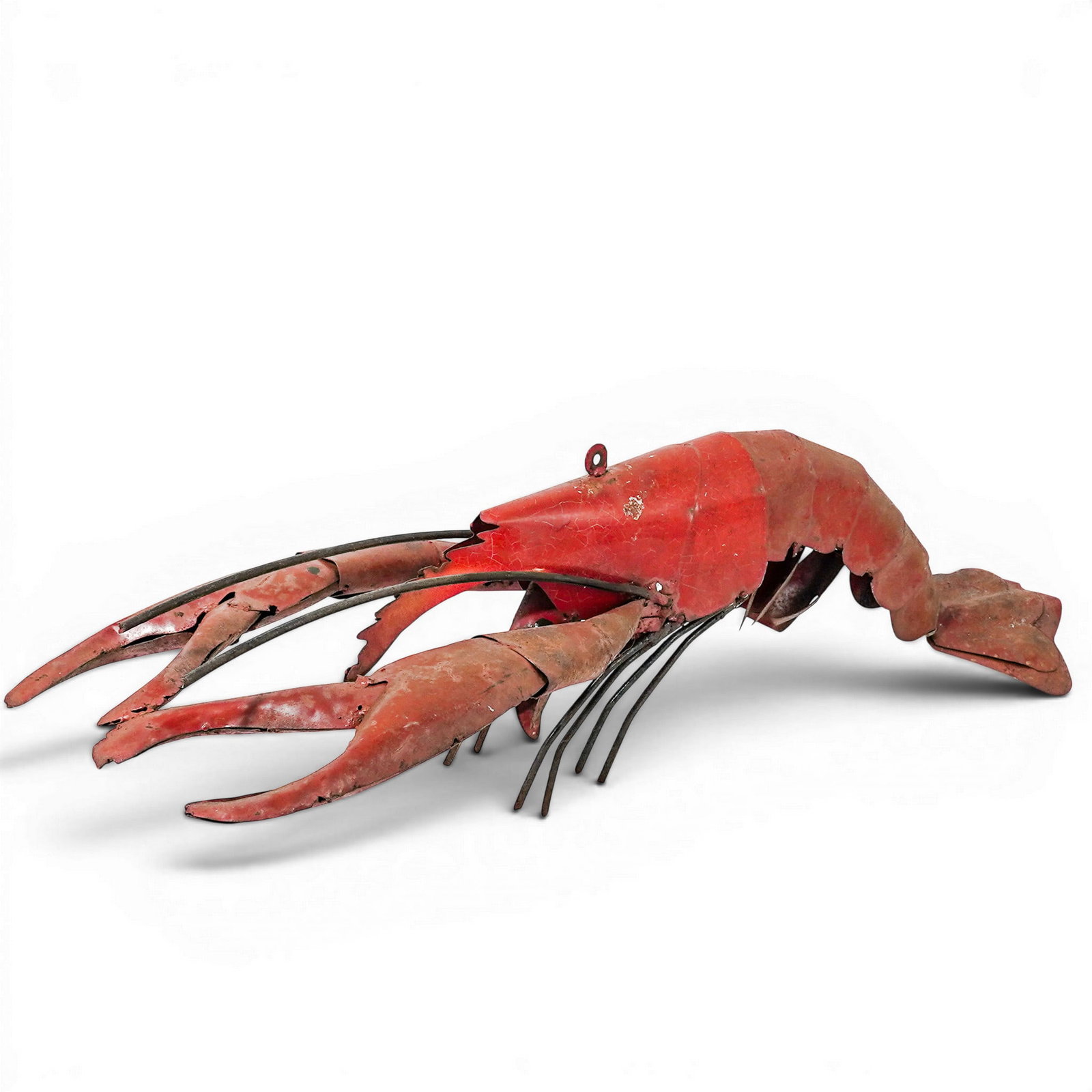 Metal Lobster Sculpture Trade Sign: Metal Lobster Sculpture Trade Sign Late 20th Century, USA. Decorative Metal Lobster Sculpture, constructed of sheet metal with articulated-style elements and painted red surface. L: 35" x W: 11" x H: