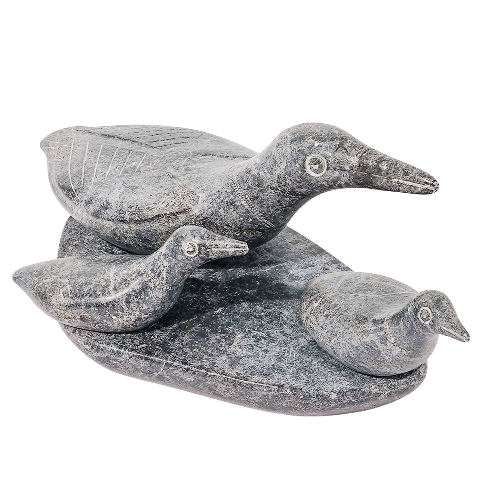 E. Paulosie Inuit Soapstone Loon Sculpture: E. Paulosie Inuit Soapstone Loon Sculpture Late 20th c., Canada Inuit hand-carved soapstone sculpture depicting a family of loons, with a mother and two smaller chicks. All of the pieces are