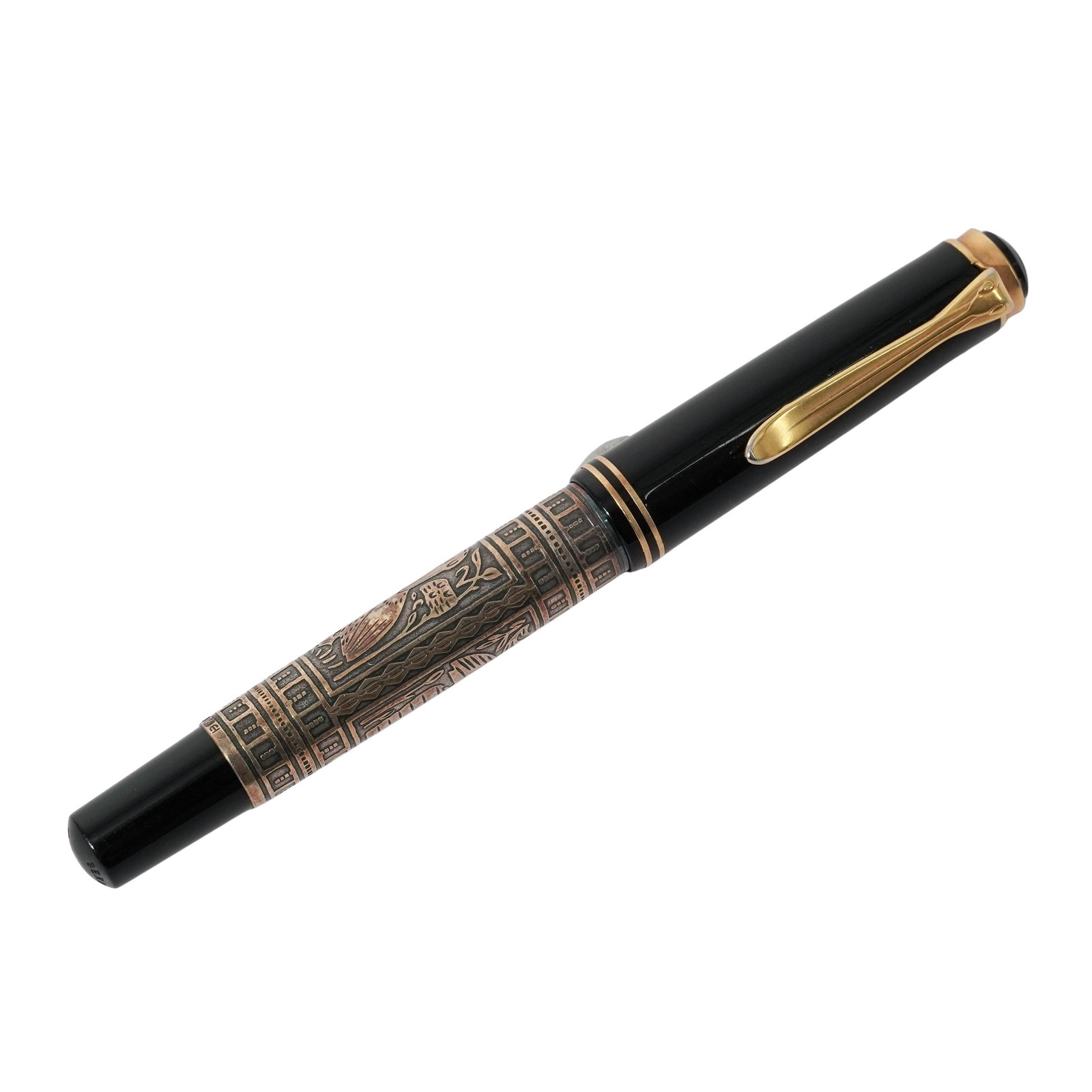 Vintage Pelikan M900 Toledo Fountain Pen: Vintage Pelikan M900 Toledo Fountain Pen Late 20th Century, Germany. Pelikan Model M900 “Toledo” Fountain Pen, featuring black resin body with gold-plated sterling silver barrel engraved in th