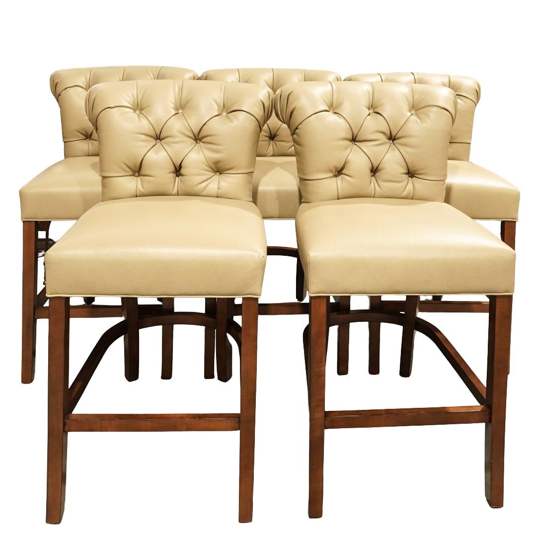 (5 pcs) O. Henry House Tufted Leather Bar Stools: (5 pcs) O. Henry House Tufted Leather Bar StoolsLate 20th century, AmericanA set of five O. Henry House tufted leather bar stools, with beige tufted leather upholstery and dark wood legs.Provenance: P