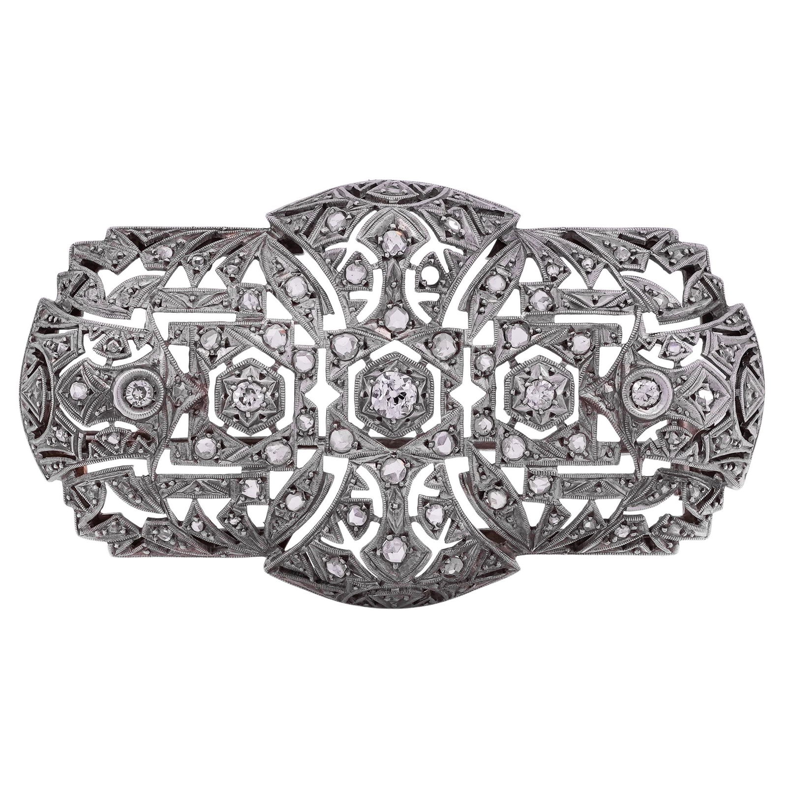 Art Deco Platinum & Old European Diamond Cut Brooch: Art Deco Platinum & Old European Diamond Cut BroochCirca: 1920s-1930s, European.Platinum openwork Art Deco brooch with geometric pierced construction and milgrain detailing. Set with Old European–cu