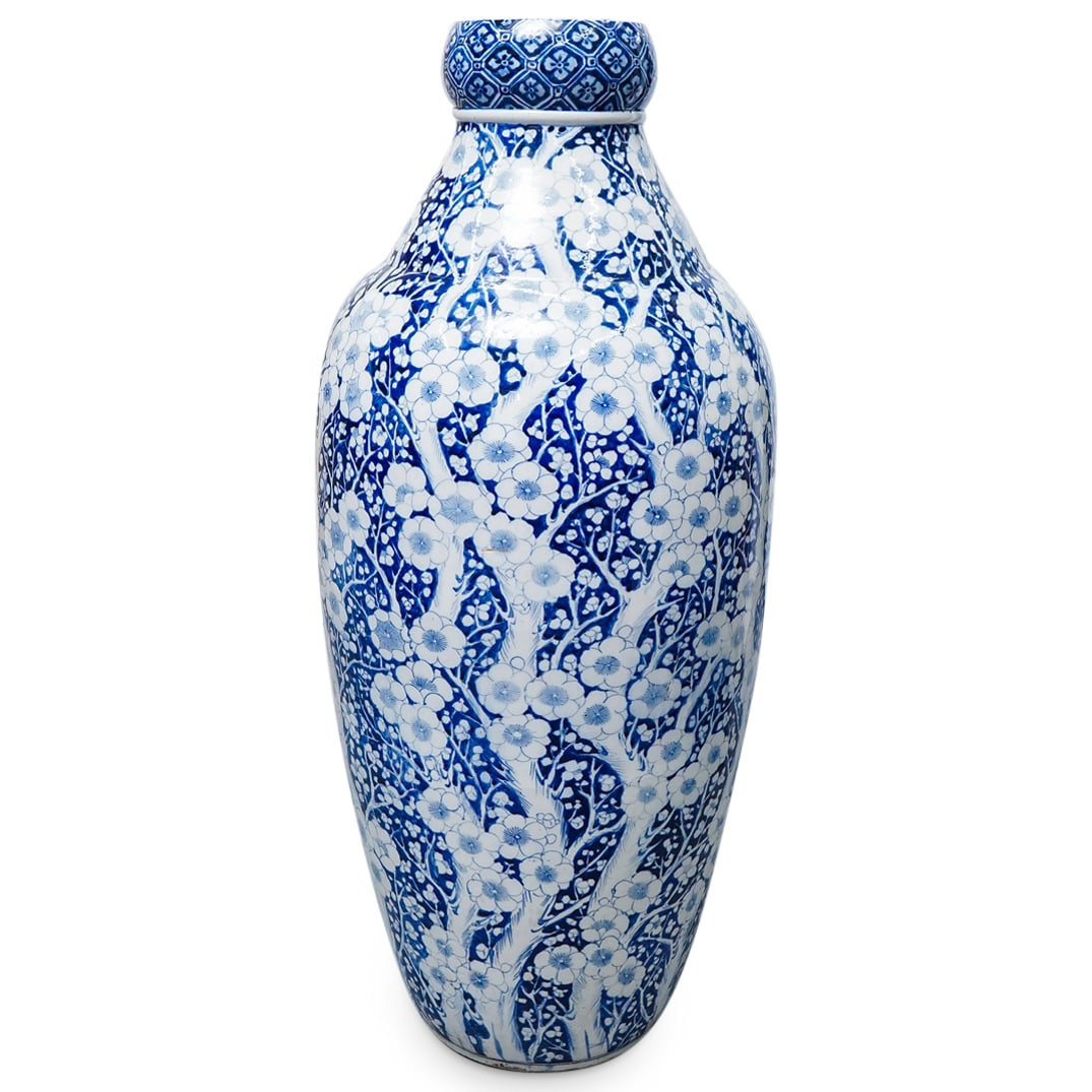 Large Antique Chinese Blue & White Porcelain Floor Vase: Large Antique Chinese Blue & White Porcelain Floor VaseEarly 20th Cent. ChinaAntique blue and white porcelain floor vase featuring blossoming branches reaching from foot to neck and sporting flower la