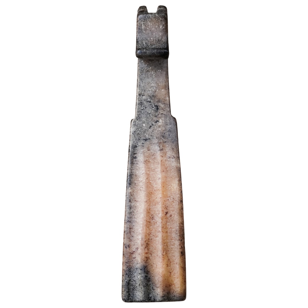 Antique Chinese Qing Dynasty Muddled Jade Belt Hook: Antique Chinese Qing Dynasty Muddled Jade Belt HookLate 18th- early 19th century, ChinaAn antique Chinese muddled jade belt hook from the Qing Dynasty with a decorative carved design.L 3.75" W .75"