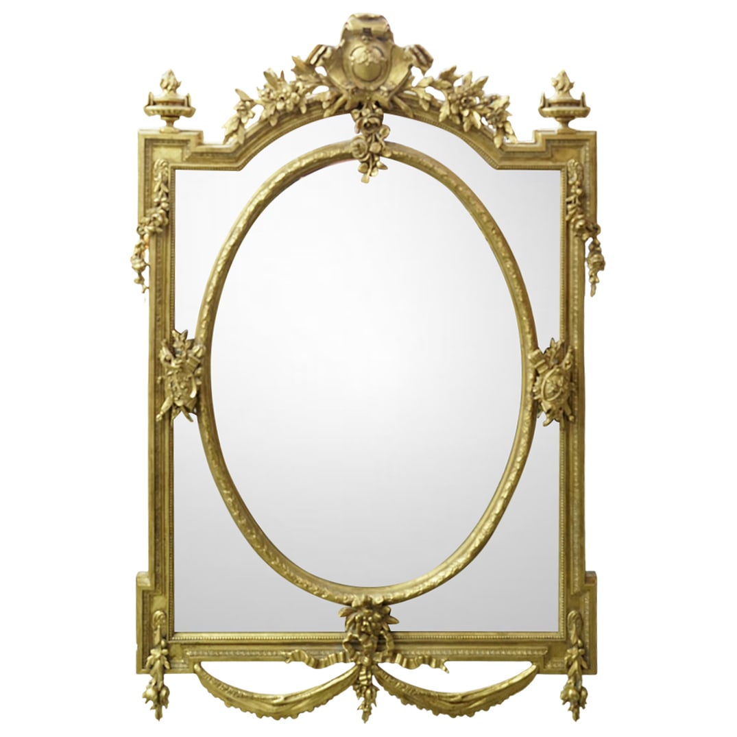 19th Cent. French Gilt Wood Beveled Glass Mirror: 19th Cent. French Gilt Wood Beveled Glass Mirror19th century, FrenchA 19th century French gilt wood mirror with beveled glass. Ornate floral carvings throughout.H 57" x W 40"