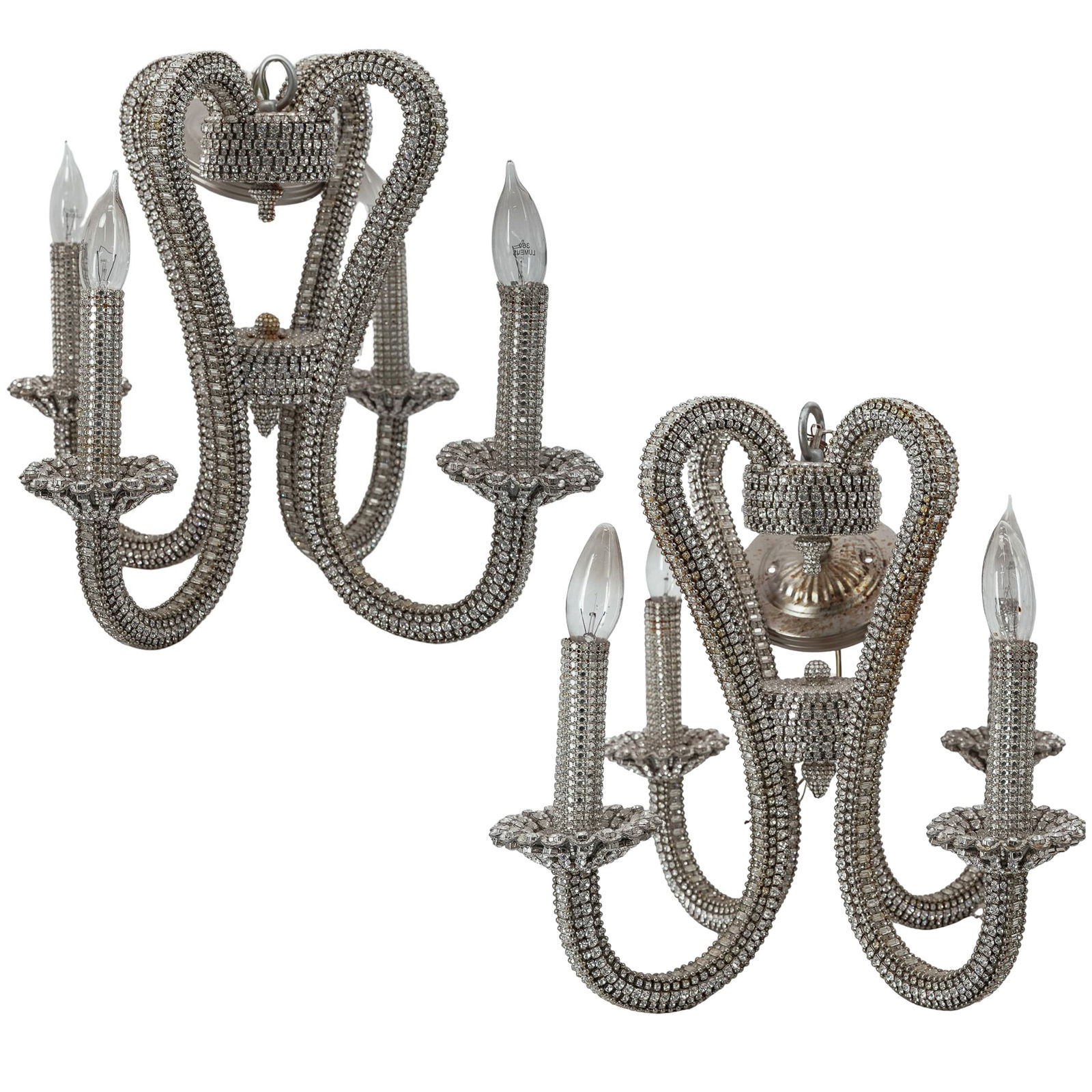 Pair of B.B. Simon Swarovski Crystal Chandeliers: Pair of B.B. Simon Swarovski Crystal Chandeliers 20th century A pair of B.B. Simon Swarovski crystal four-light chandeliers. H 20.25" x Diameter 18"